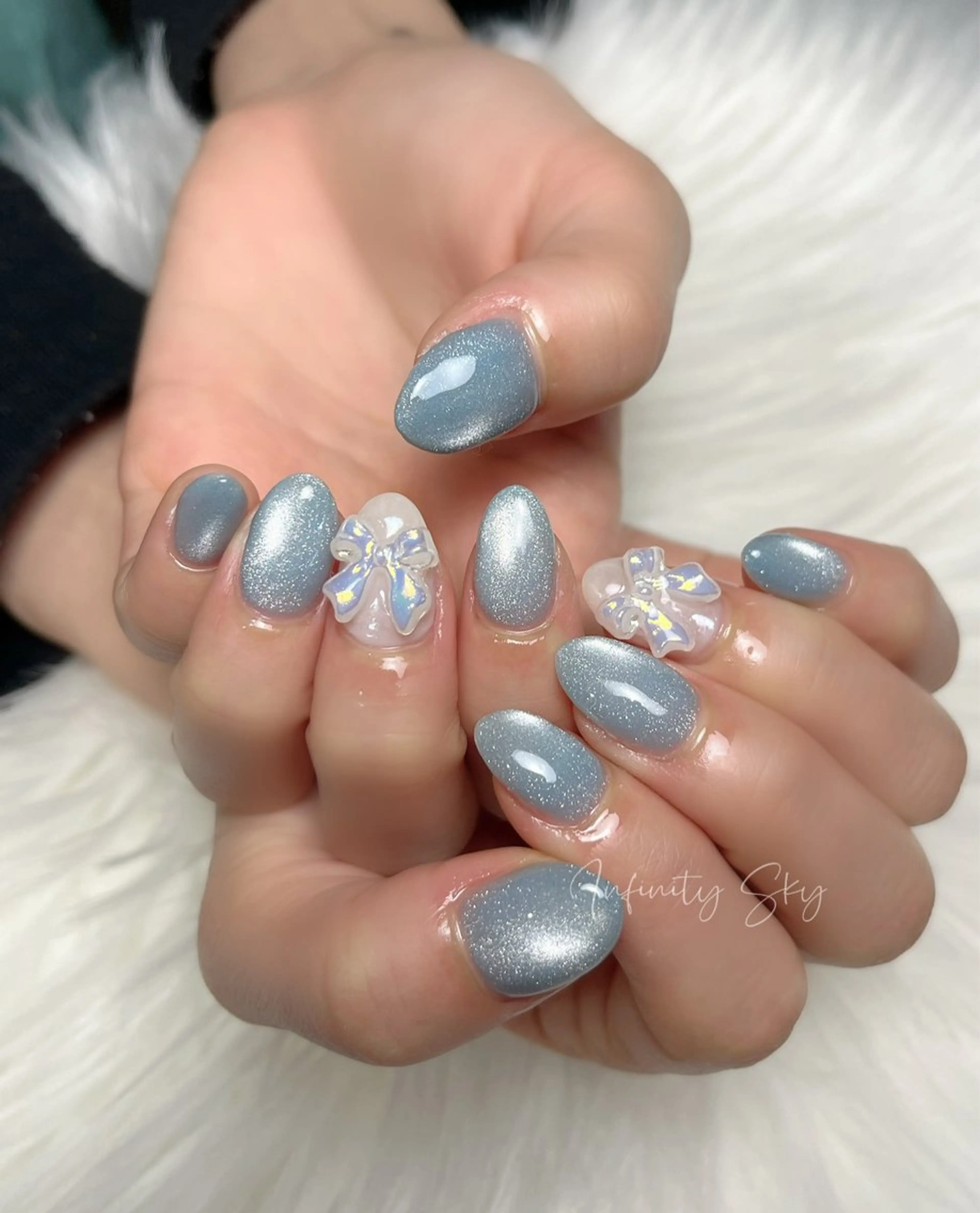 ネイル マグネットネイル リボン infinity skyのネイルデザイン