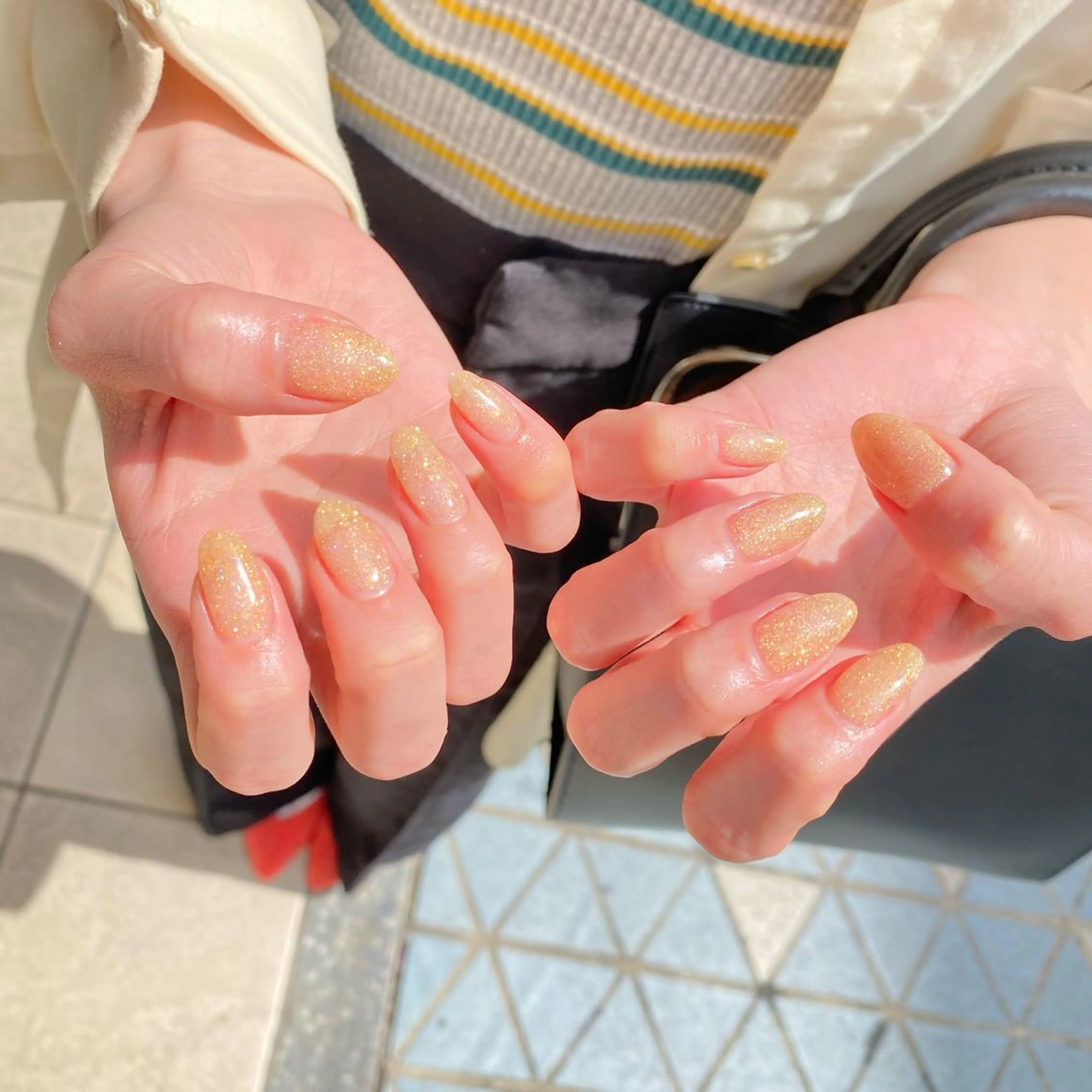 ネイル キラキラネイル オレンジ ハンドネイル pro.m Kanonのネイルデザイン