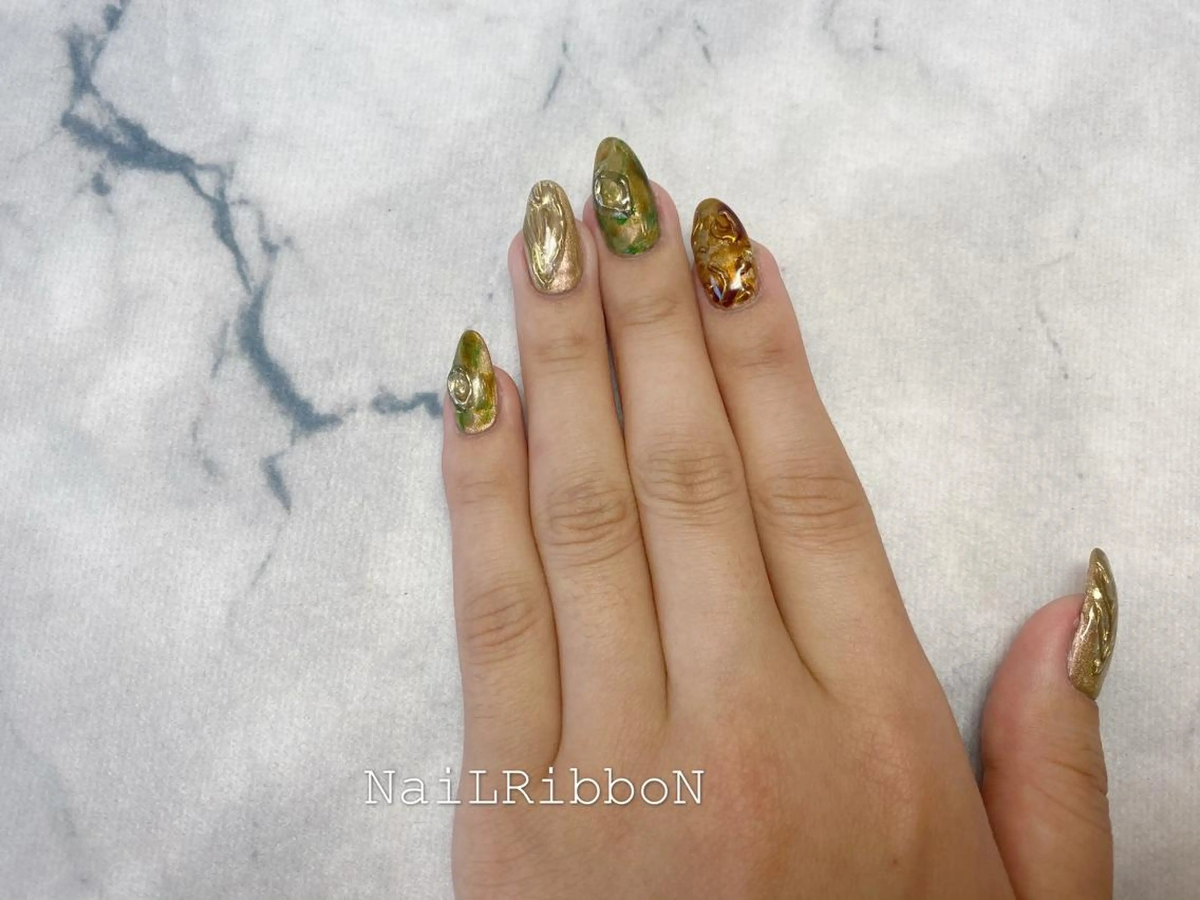 ネイル ネイルリボン 受付スタッフのネイルデザイン