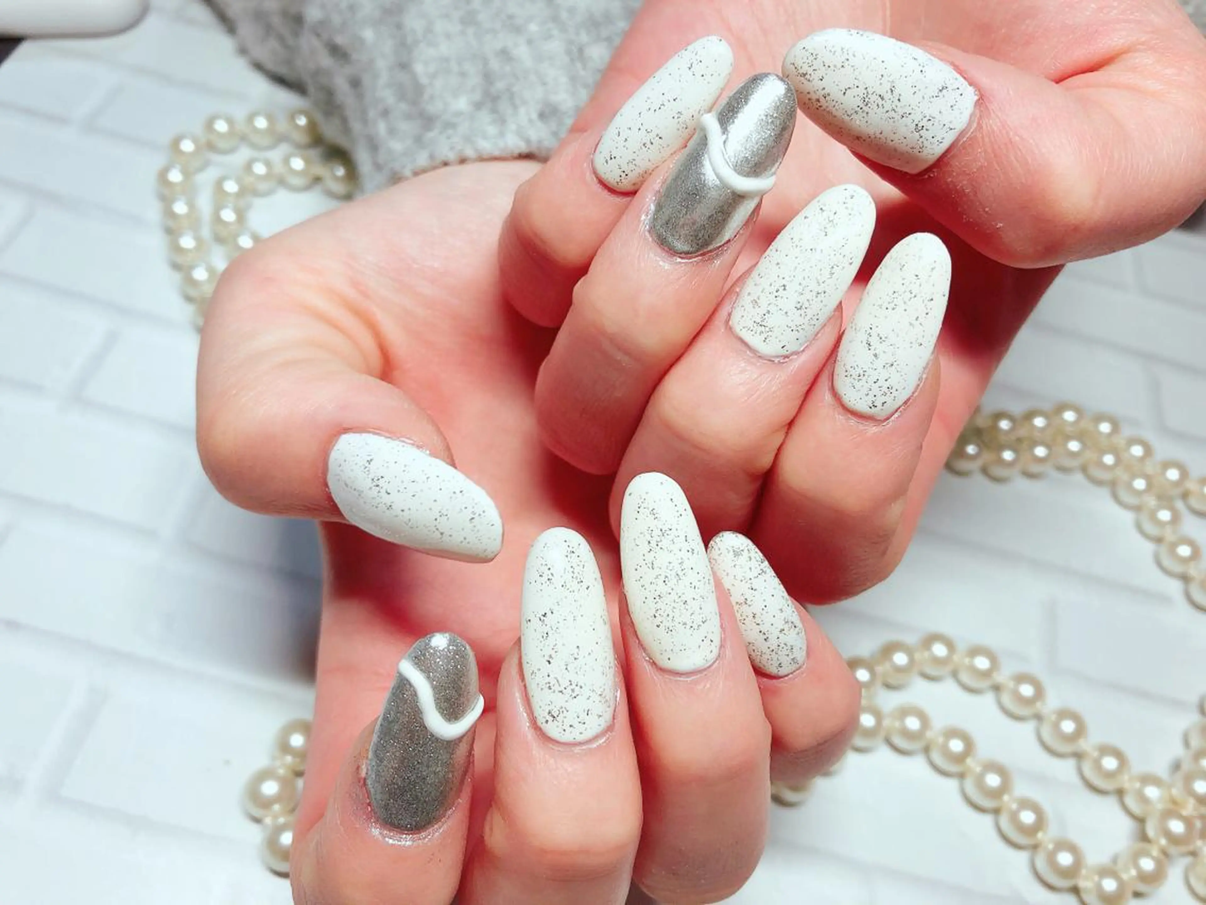 ネイル ラメ(グリッター) ホワイト ハンドネイル ハンドケア ネイルサロン HARRYS所属・ネイル･脱毛サロン HARRYSのエステ・リラクイメージ