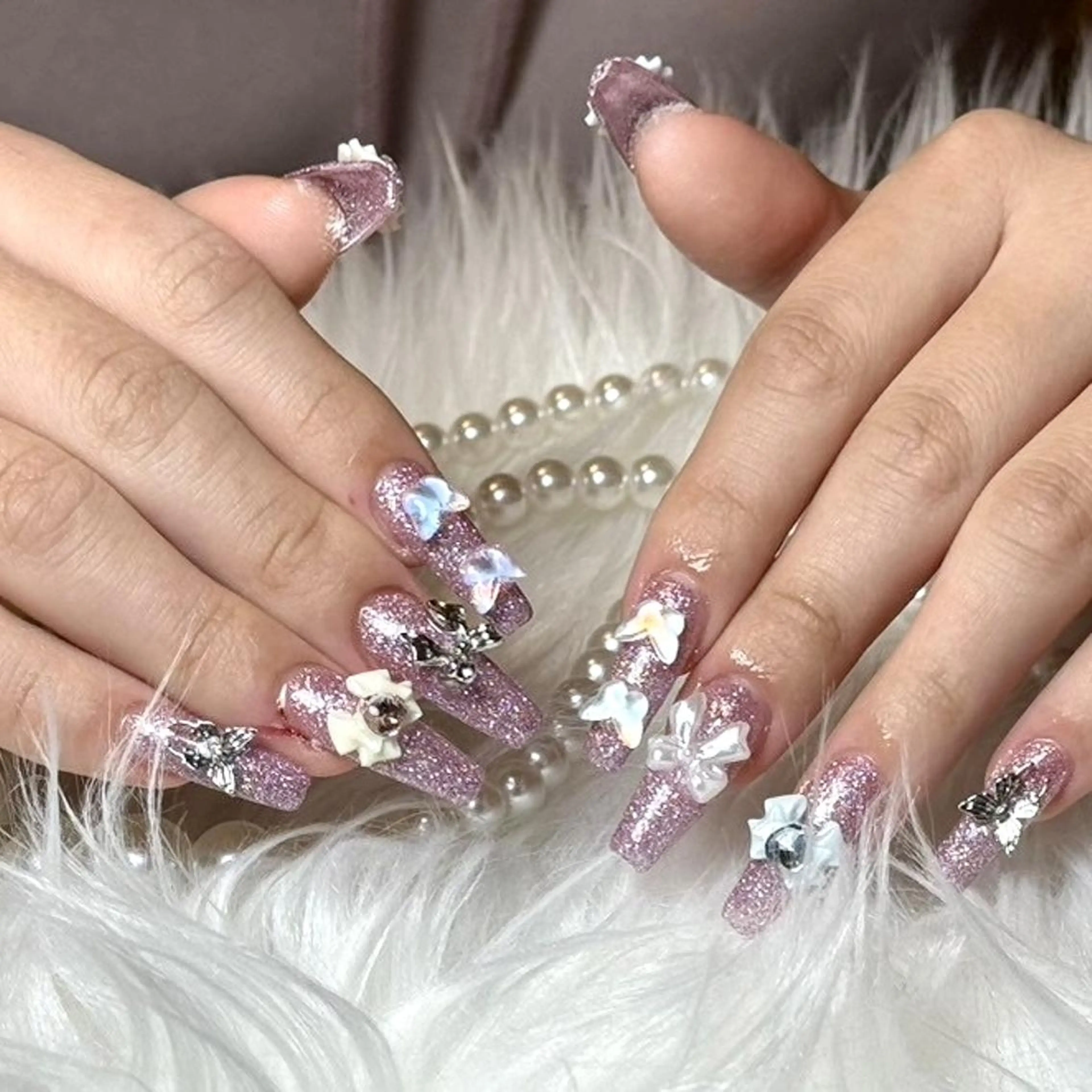 ネイル RAFFINE 月🦋🩵のネイルデザイン