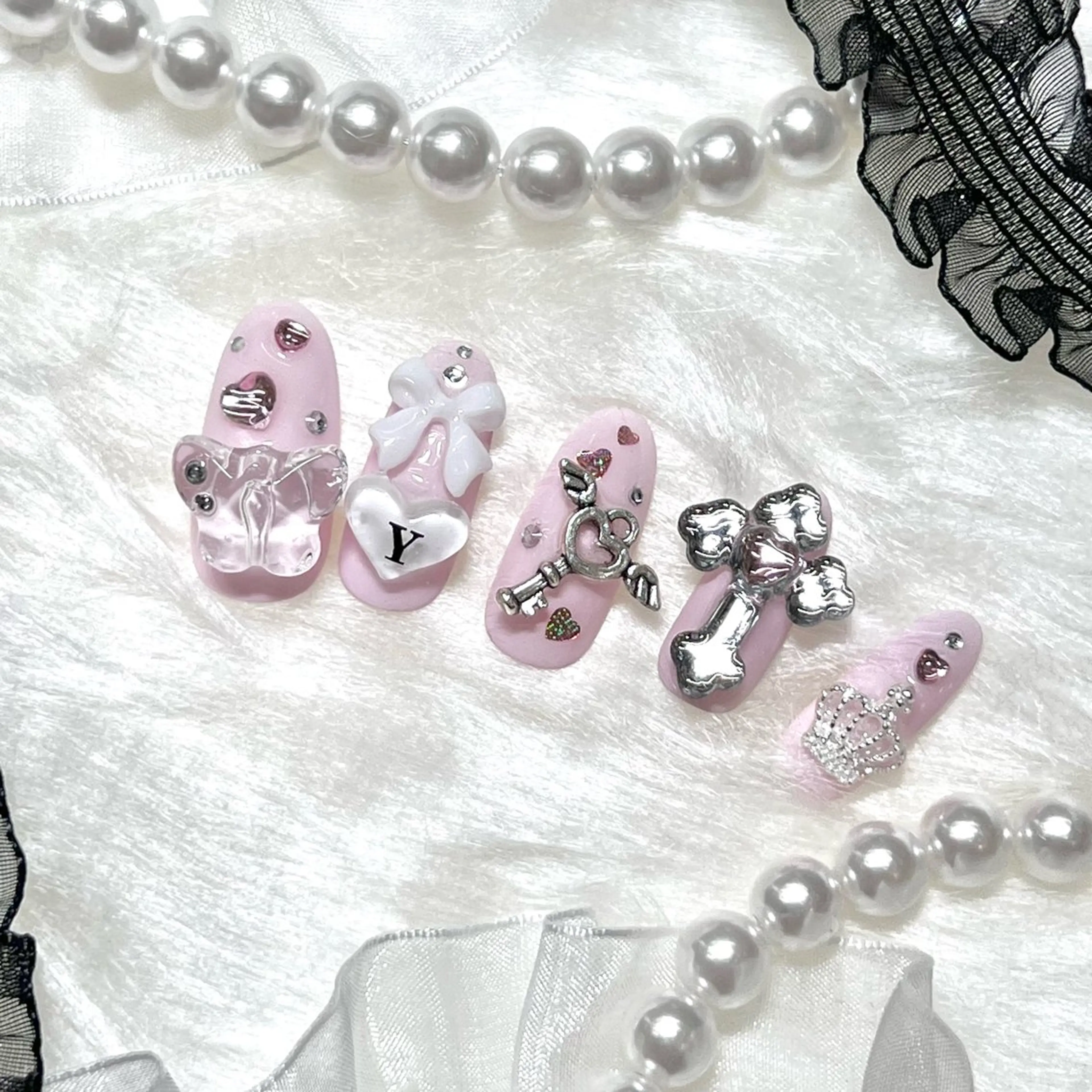 ネイル ロングネイル 痛ネイル🩷渋谷 🧸Yunaのネイルデザイン