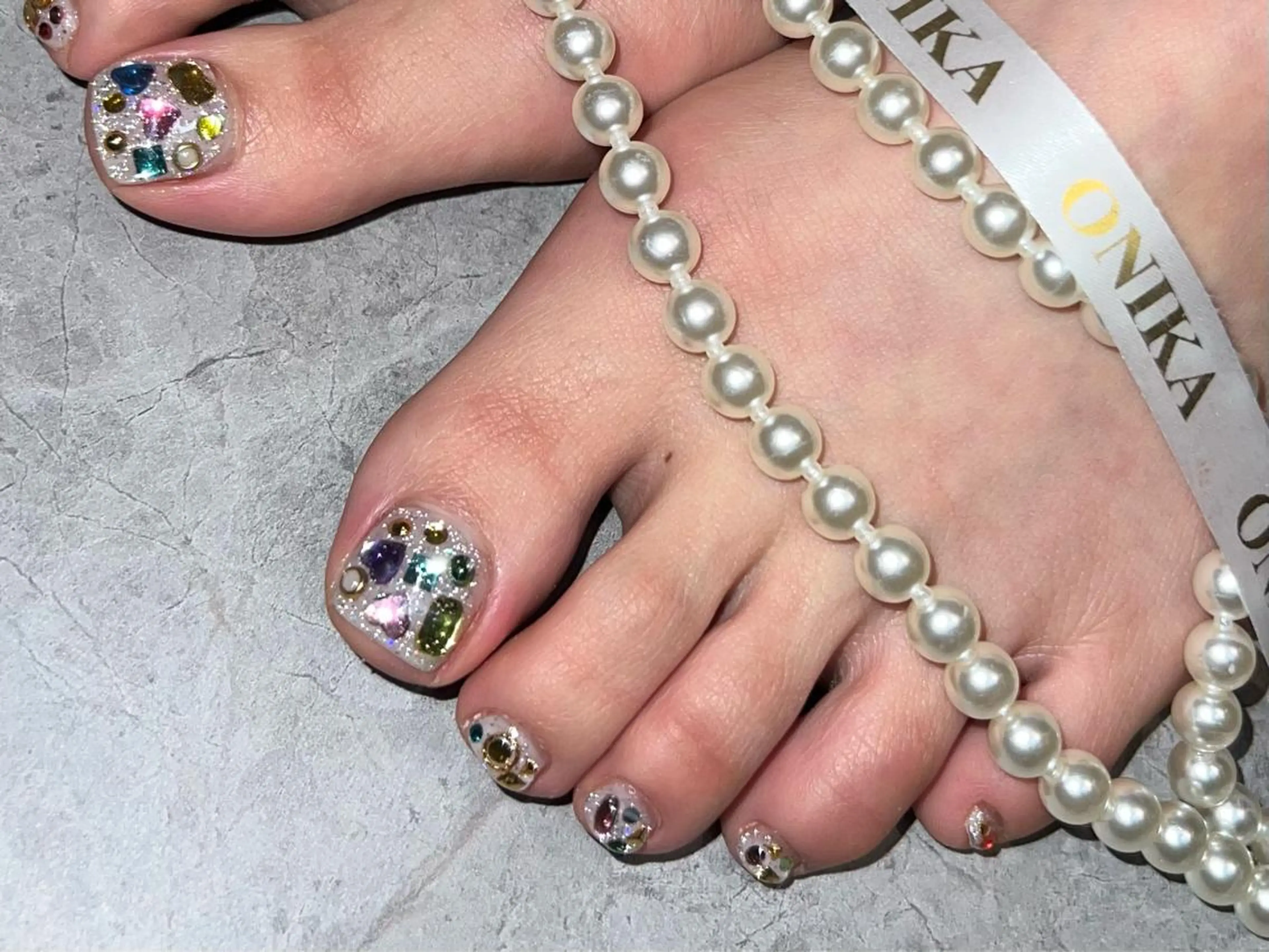 セミロング フットネイル ONIKA Nail 青山通り店所属・ONIKA Nail 表参道A4徒歩2分のネイルデザイン