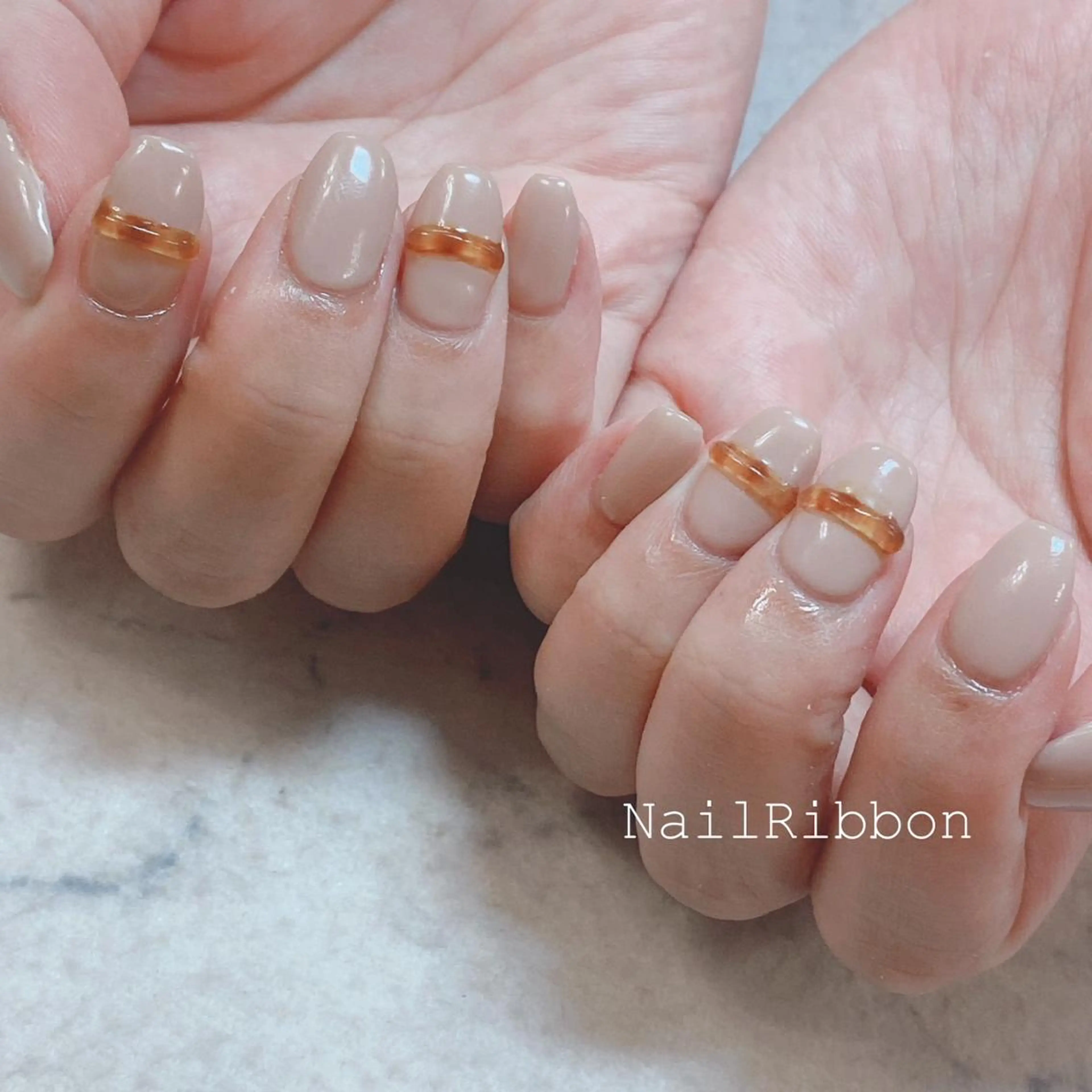 ネイル ネイルリボン 受付スタッフのネイルデザイン