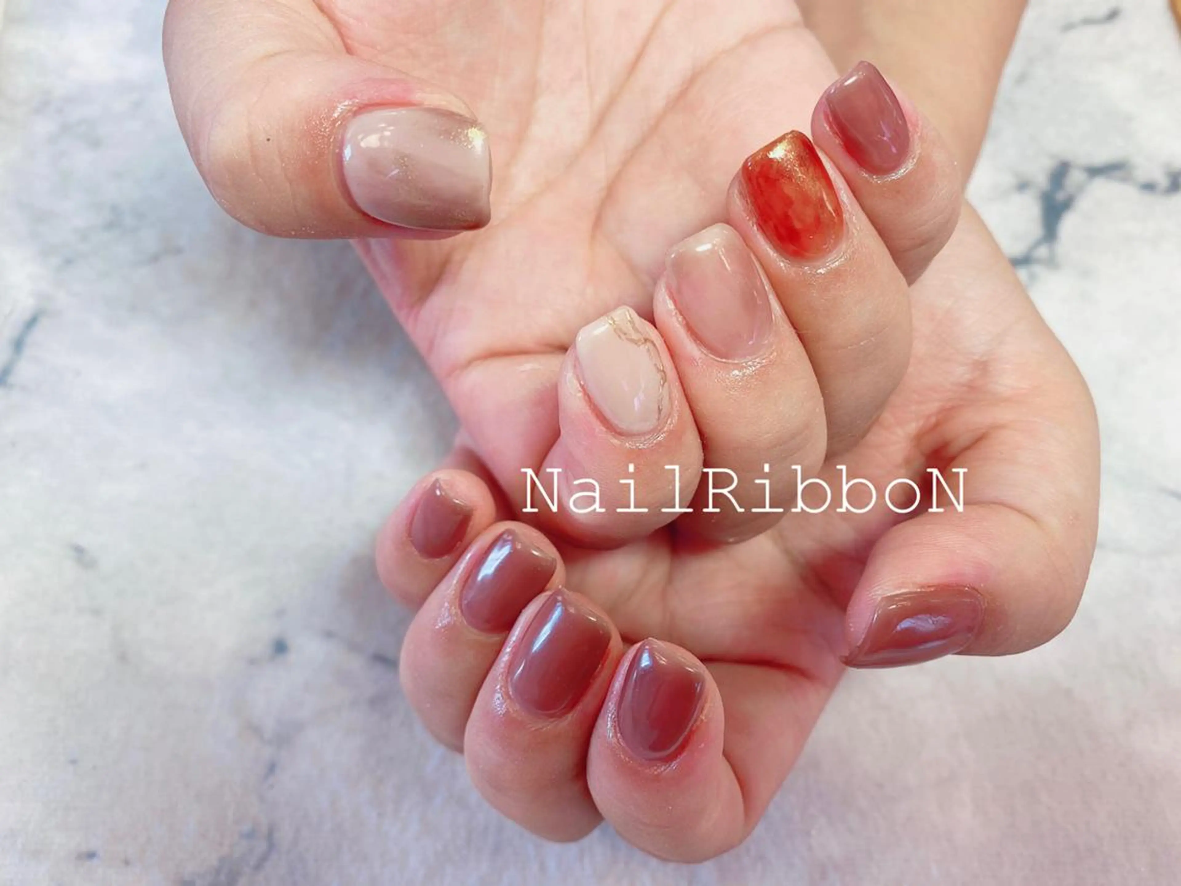 ネイル ネイルリボン 受付スタッフのネイルデザイン