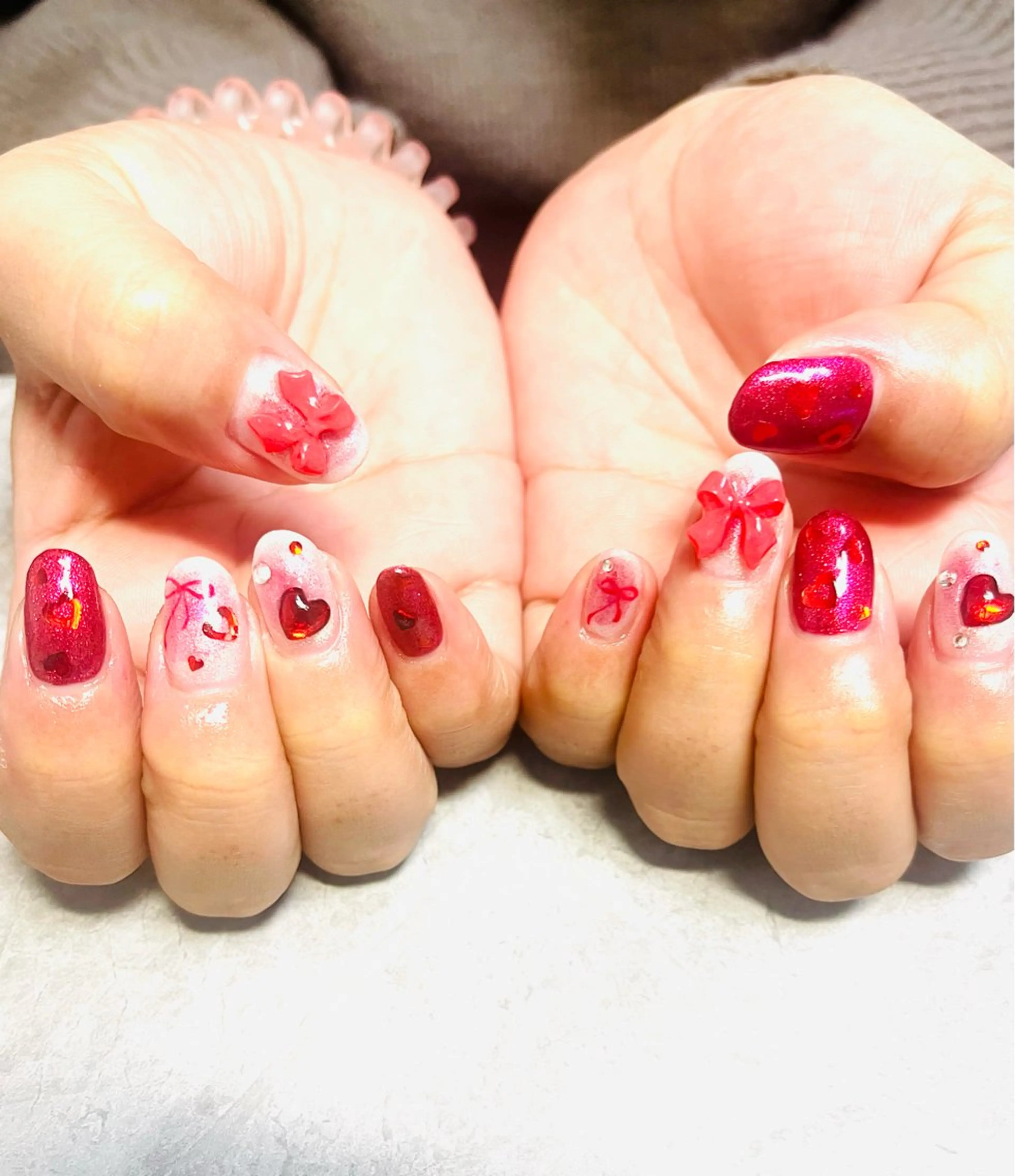 ネイル リボン 冬ネイル クリスマス ハンドネイル ハンドケア Felice所属・ベテランネイル cnc nailのネイルデザイン