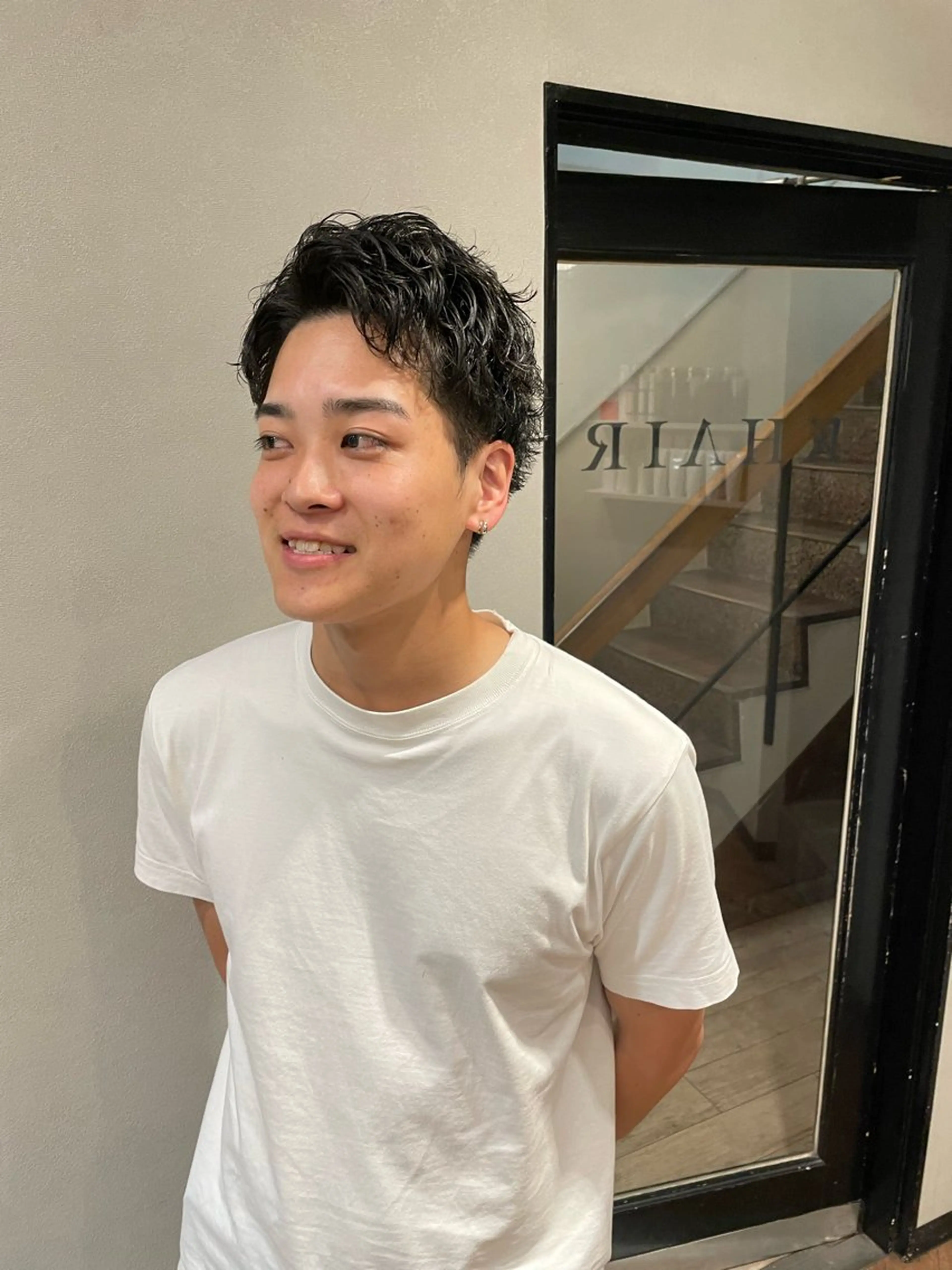 パーマ 金城 二千夏のヘアスタイル