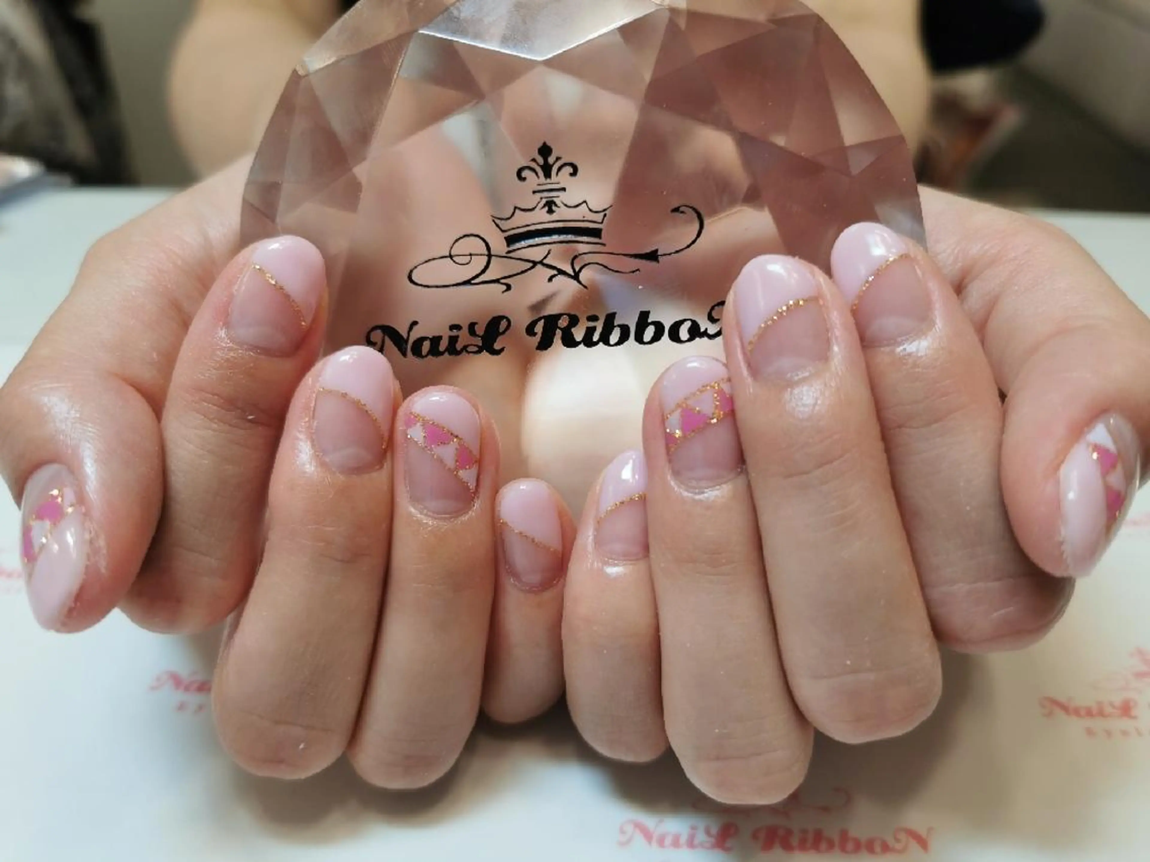 ネイル ネイルリボン 受付スタッフのネイルデザイン