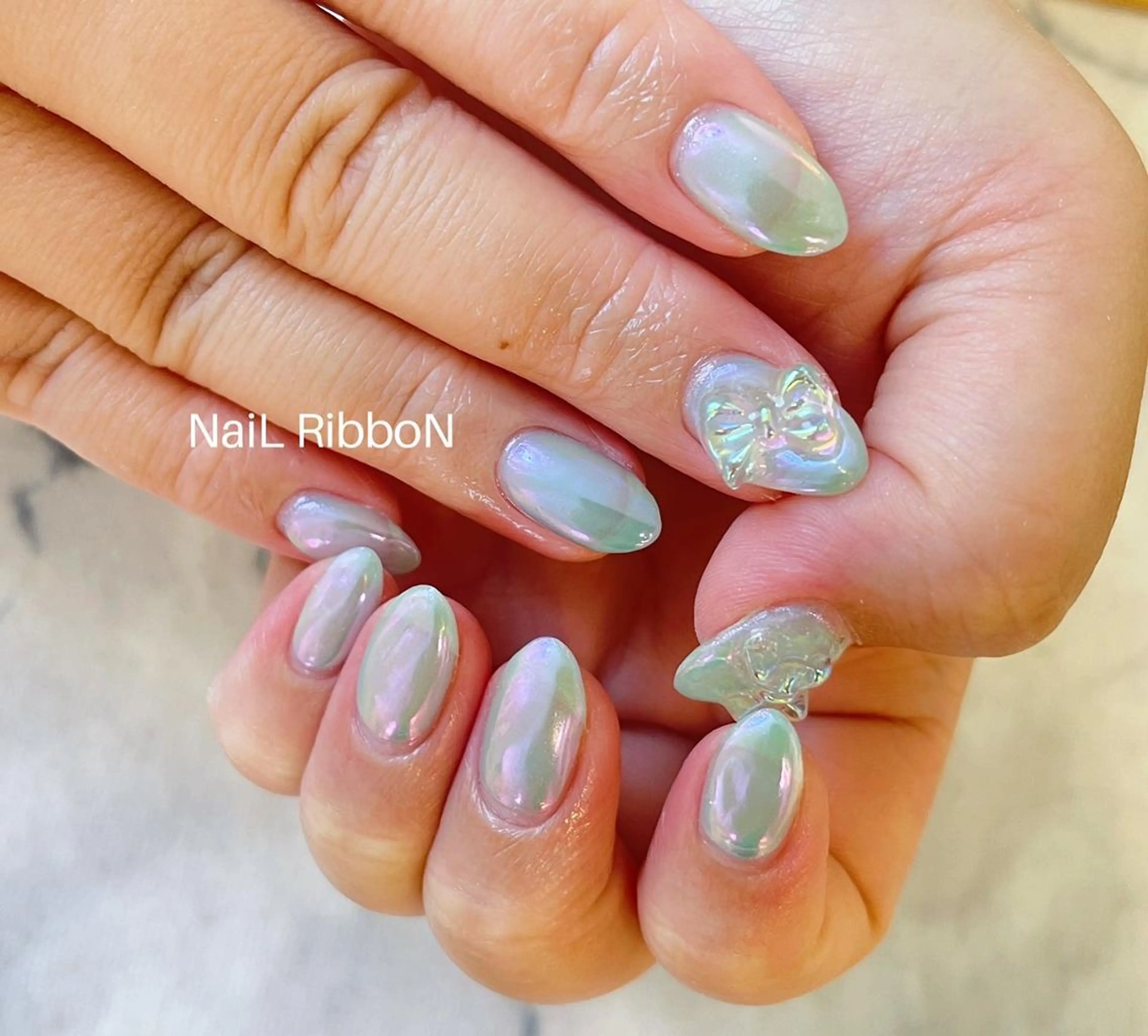 ネイル ネイルリボン 受付スタッフのネイルデザイン