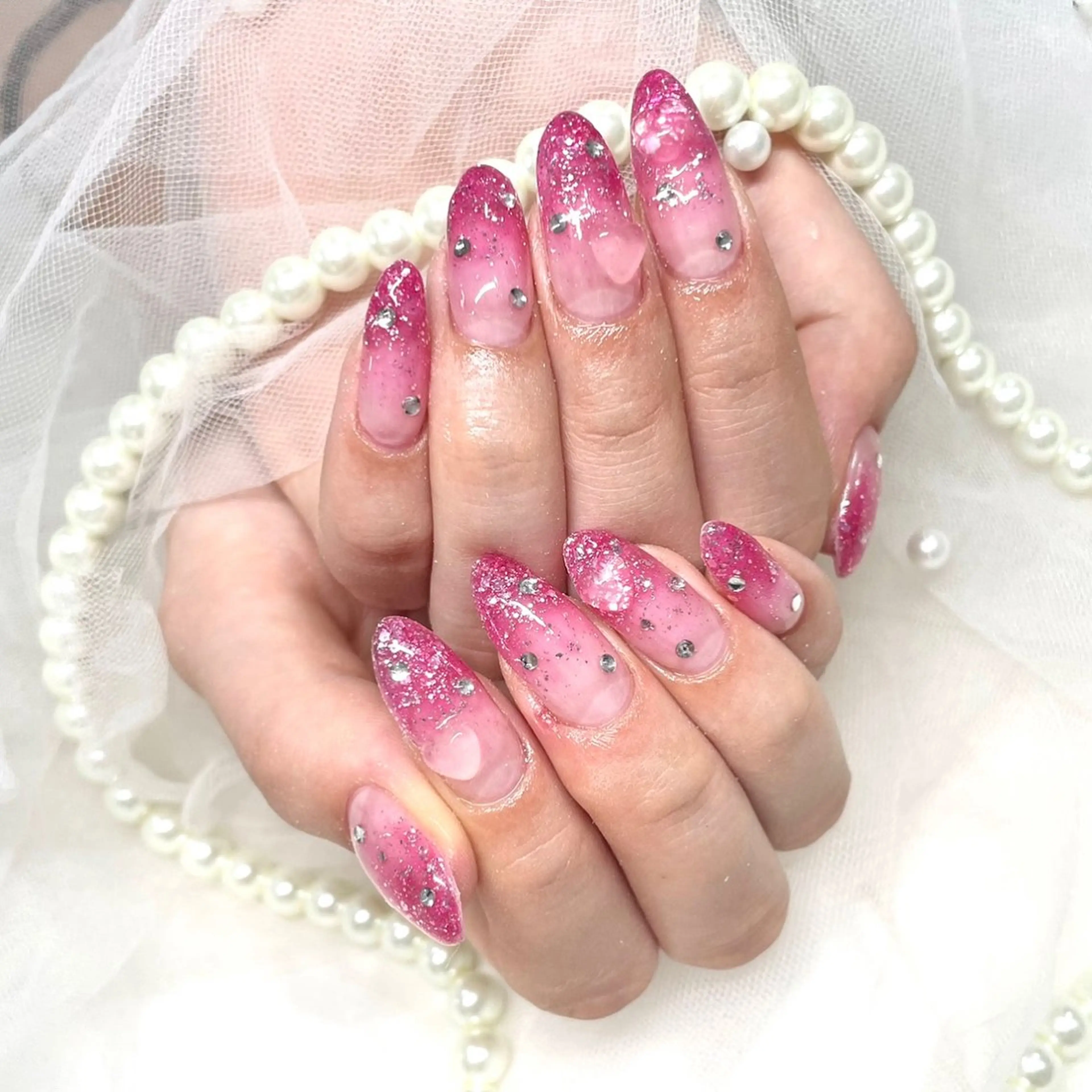 ネイル キラキラネイル ピンク ジョアアンジェ京橋店 MARINA‎🤍のネイルデザイン