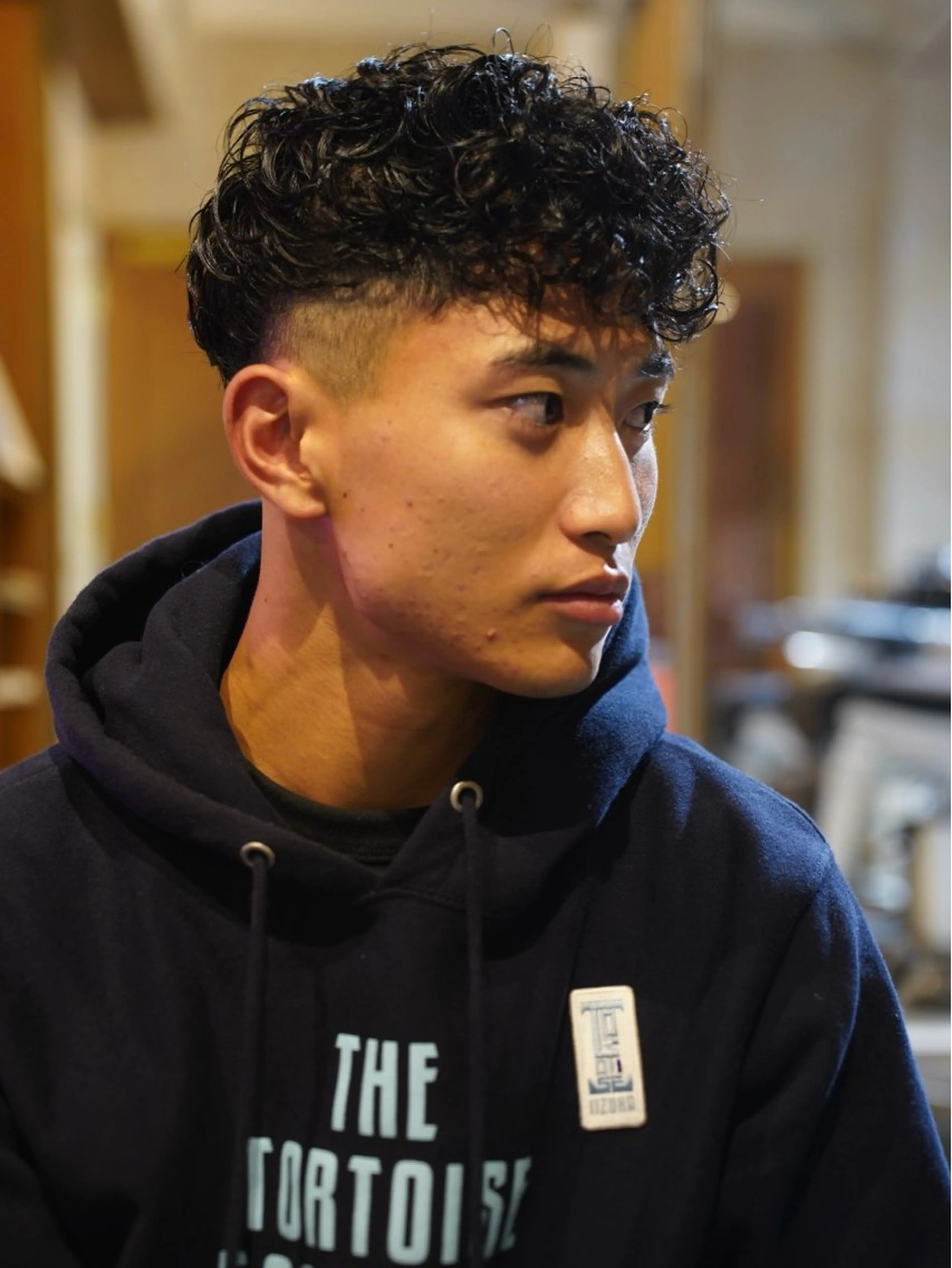 ショート パーマ メンズ フェードカット スキンフェード スペインカール メリケンビューティーパーラー所属・MERICAN / JIROのヘアスタイル