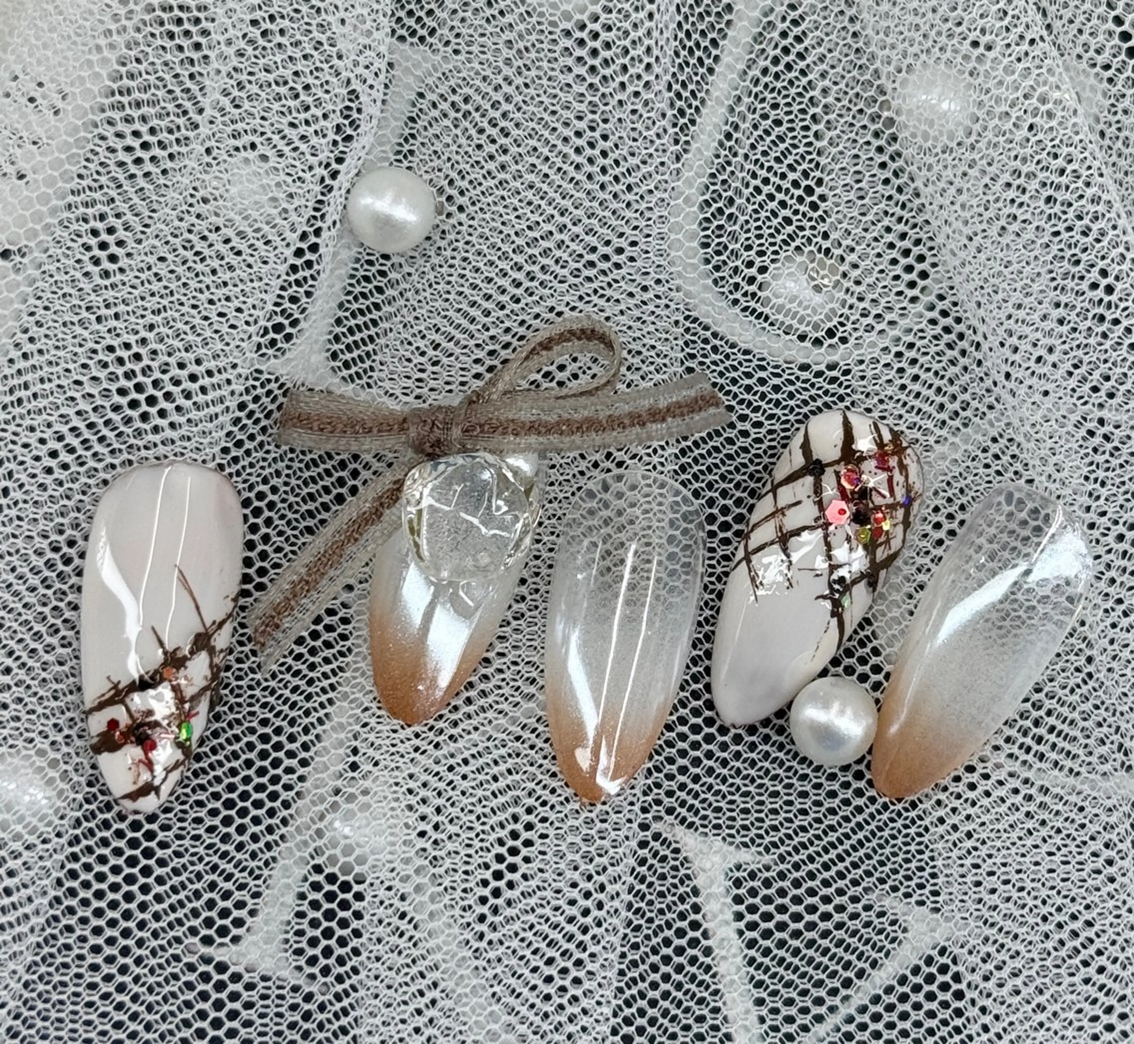 ネイル ハンドネイル フットネイル ハンドケア AngelChris ビューティーサロンのネイルデザイン