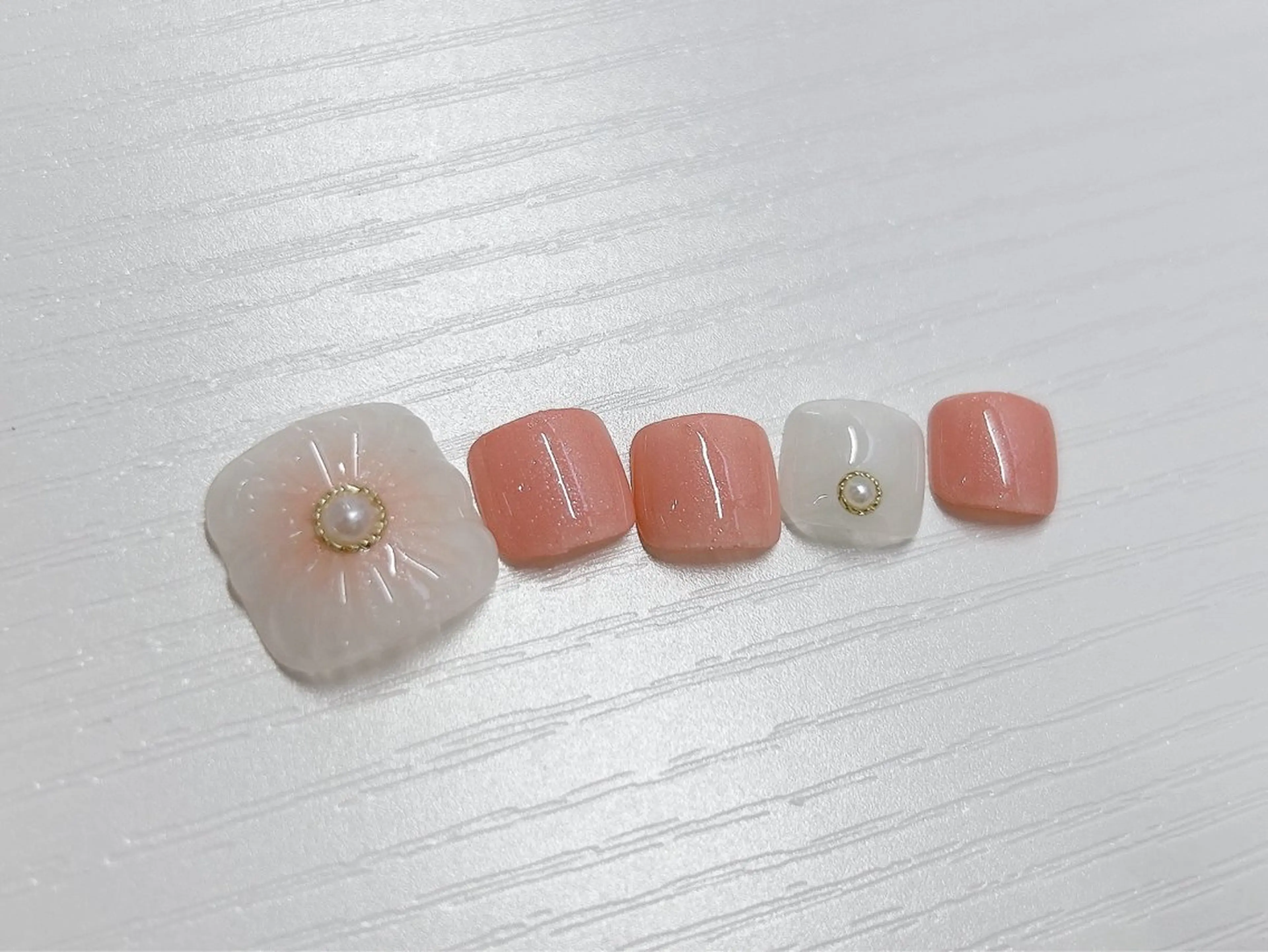 ネイル チークネイル 桜ネイル フラワーネイル フットネイル ピンク フットネイル Forca total studio所属・Forca Airaのネイルデザイン