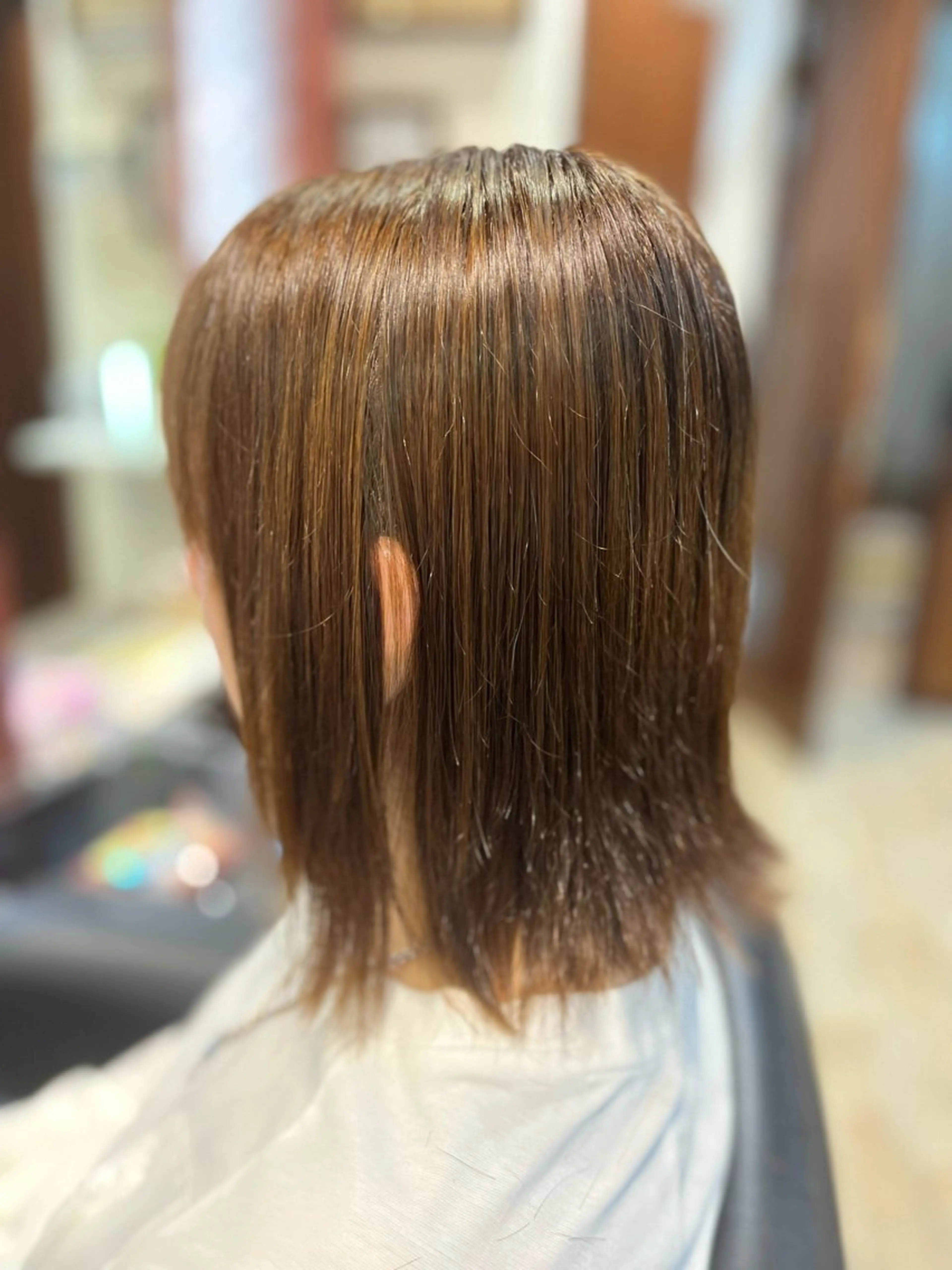 ミディアム カラー パーマ ブルーカラー 外ハネヘア 縮毛矯正 エル美容室所属・織田 英之のヘアスタイル