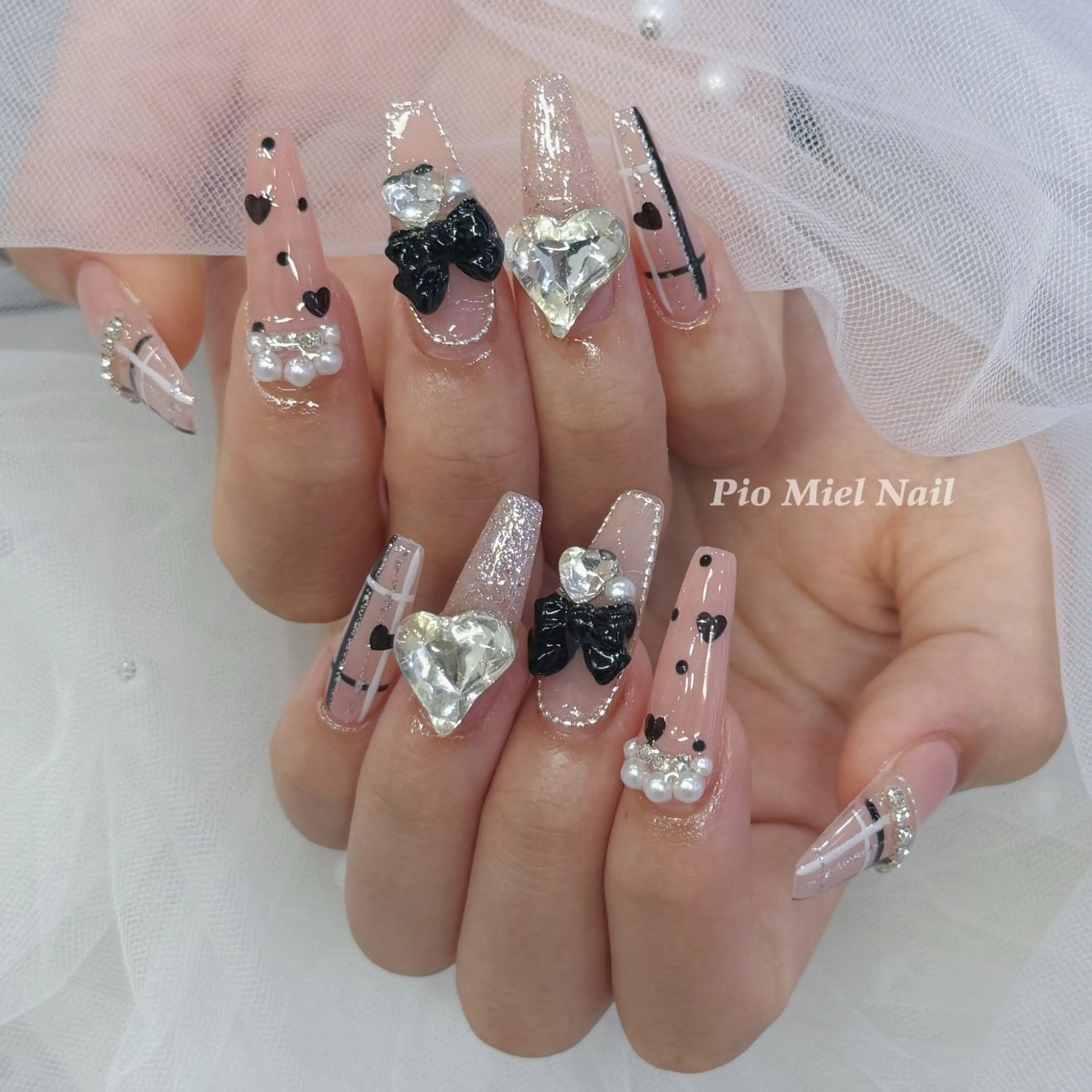 ネイル ガーリー ハート ロングネイル ピンク リボン ハンドネイル HANA 長さだしのネイルデザイン