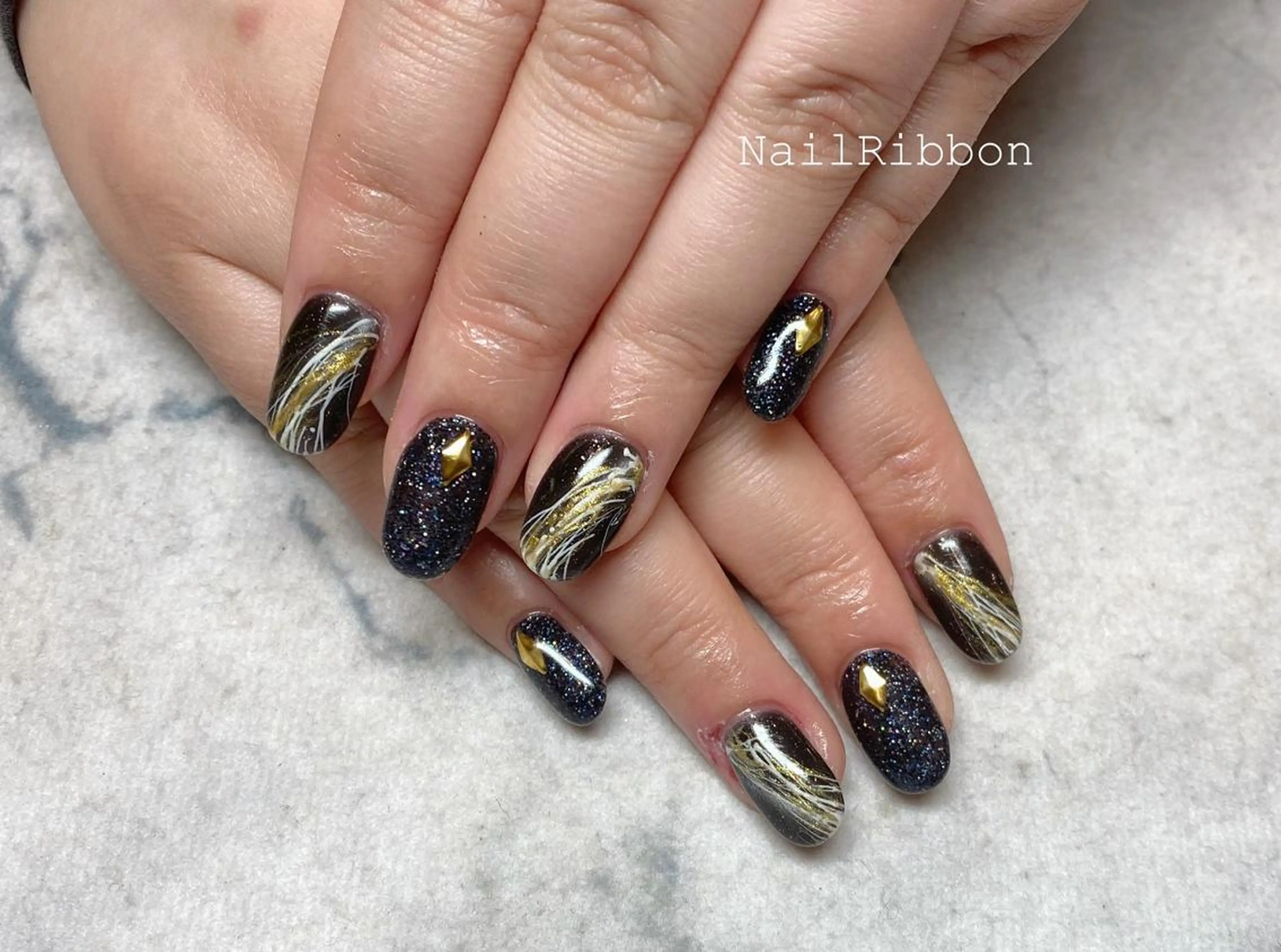 ネイル ネイルリボン 受付スタッフのネイルデザイン