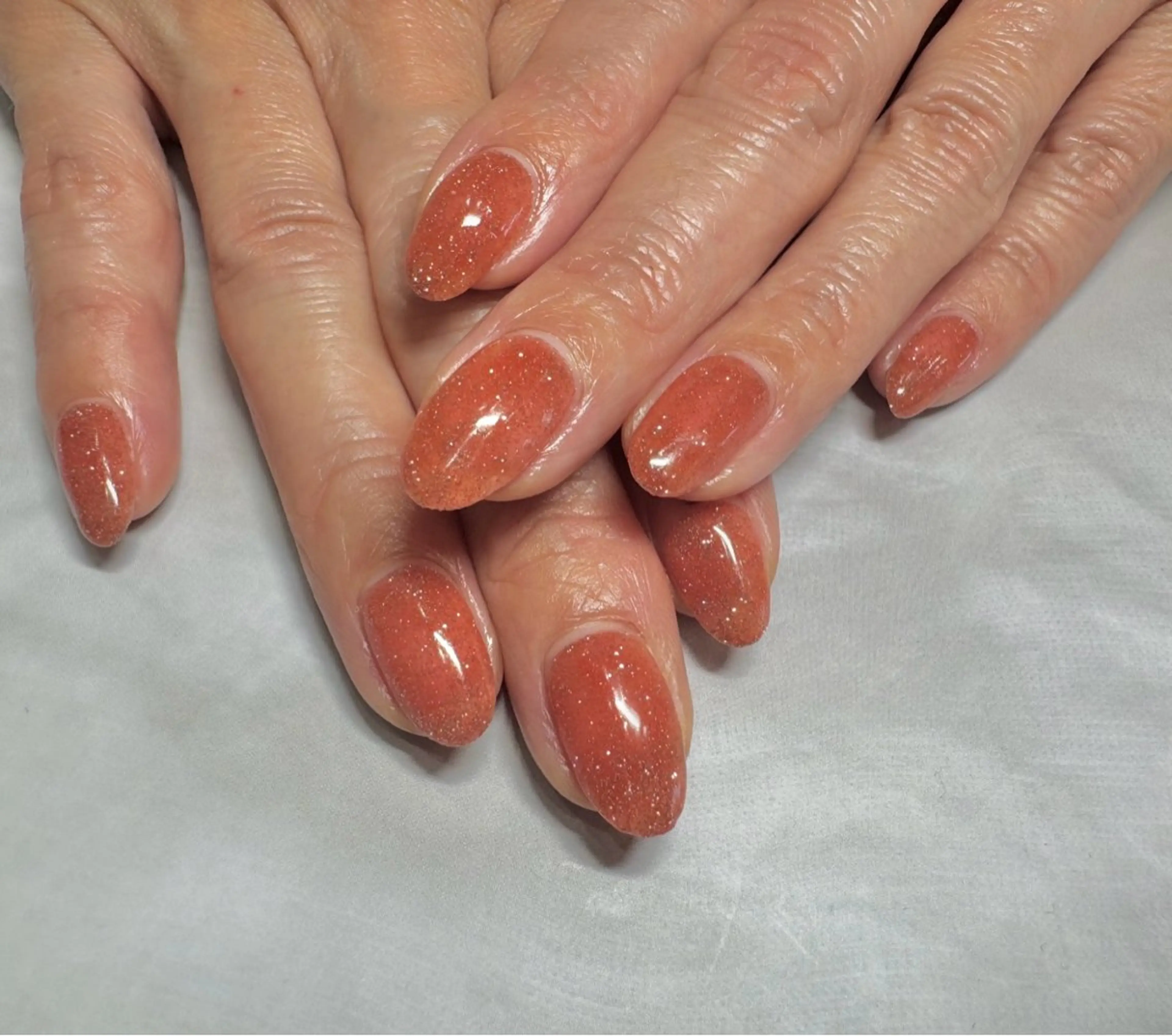 ネイル ラメ(グリッター) ワンカラーネイル オレンジ ネイルサロン La Luce所属・ネイリスト Mahoのネイルデザイン