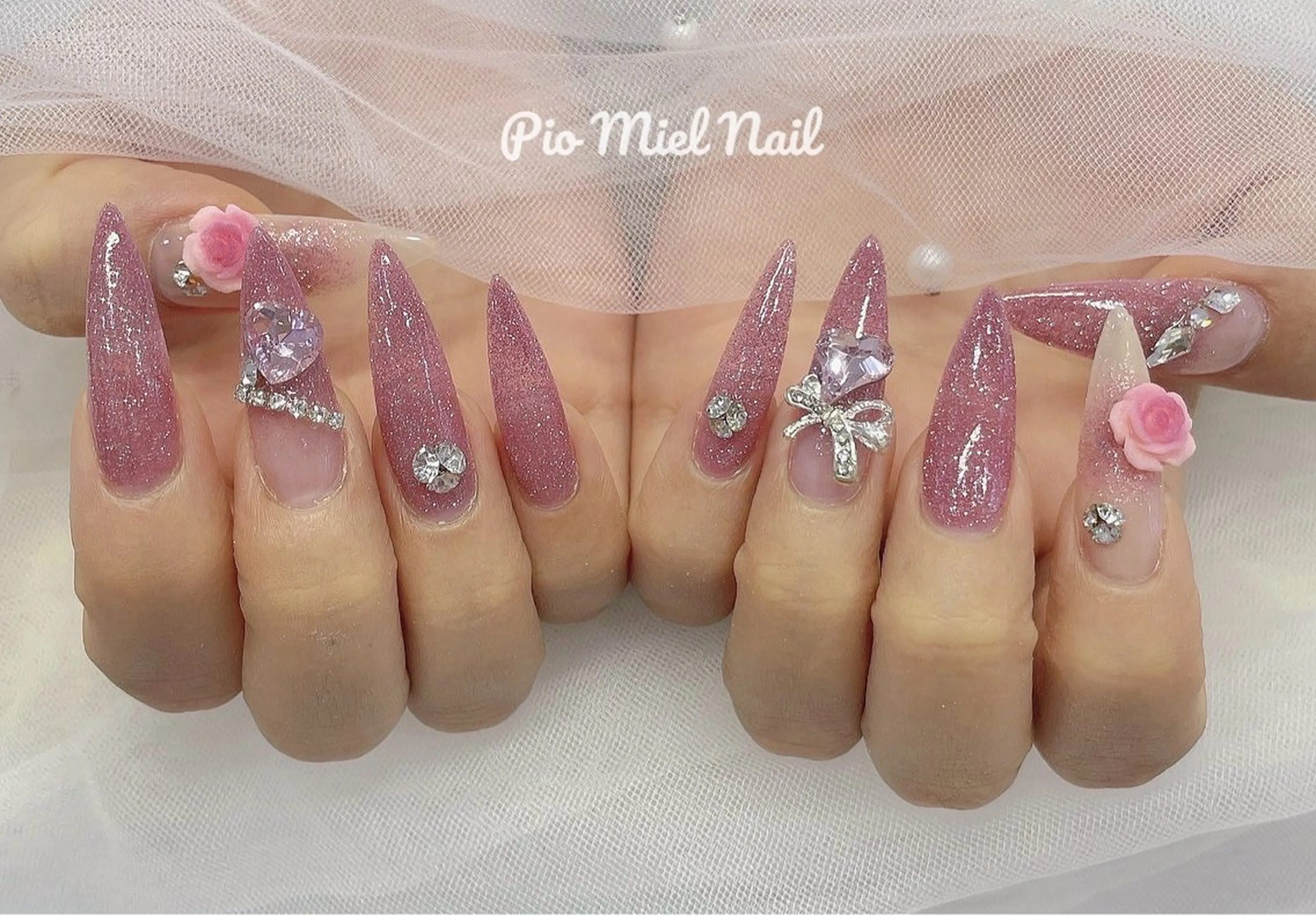 ロング ハンドネイル Pio Mielのネイルデザイン