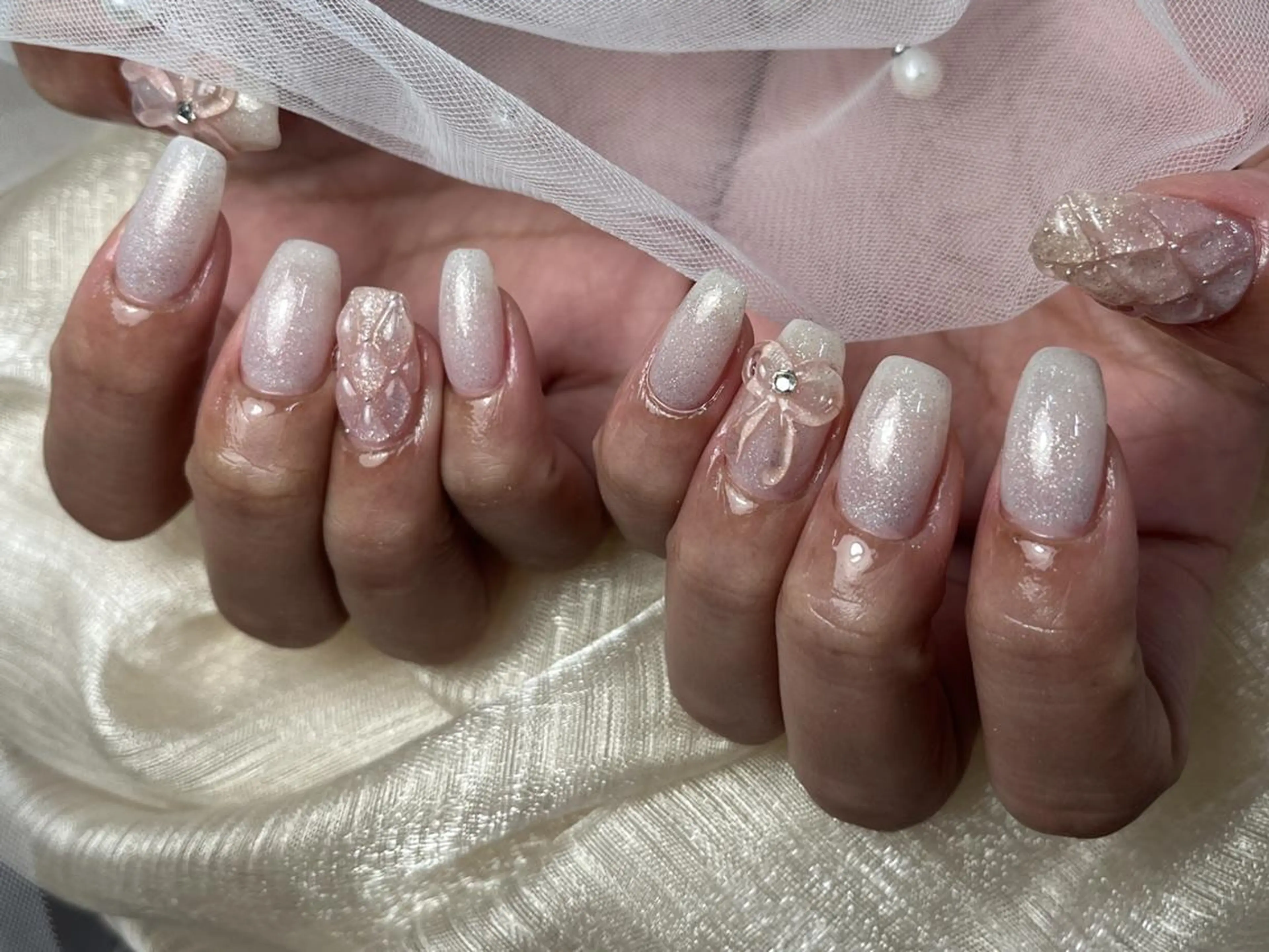 ネイル アートネイル グラデーション ラメ(グリッター) ラメグラデーション リボン ハンドネイル ToliyDeliy Nail Salonのネイルデザイン