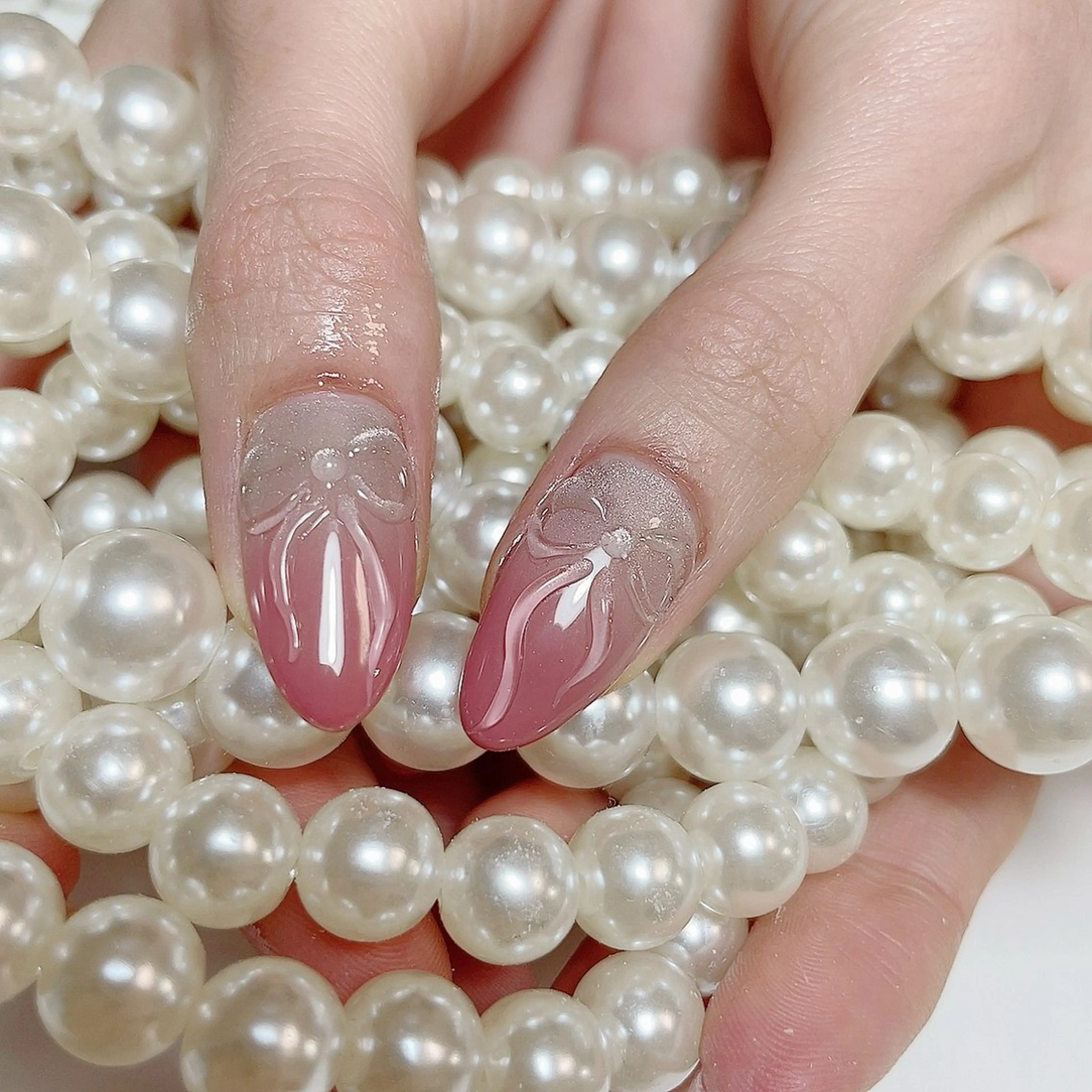 ネイル グラデーション マグネットネイル リボン 春ネイル か な🧚‍♀️のネイルデザイン