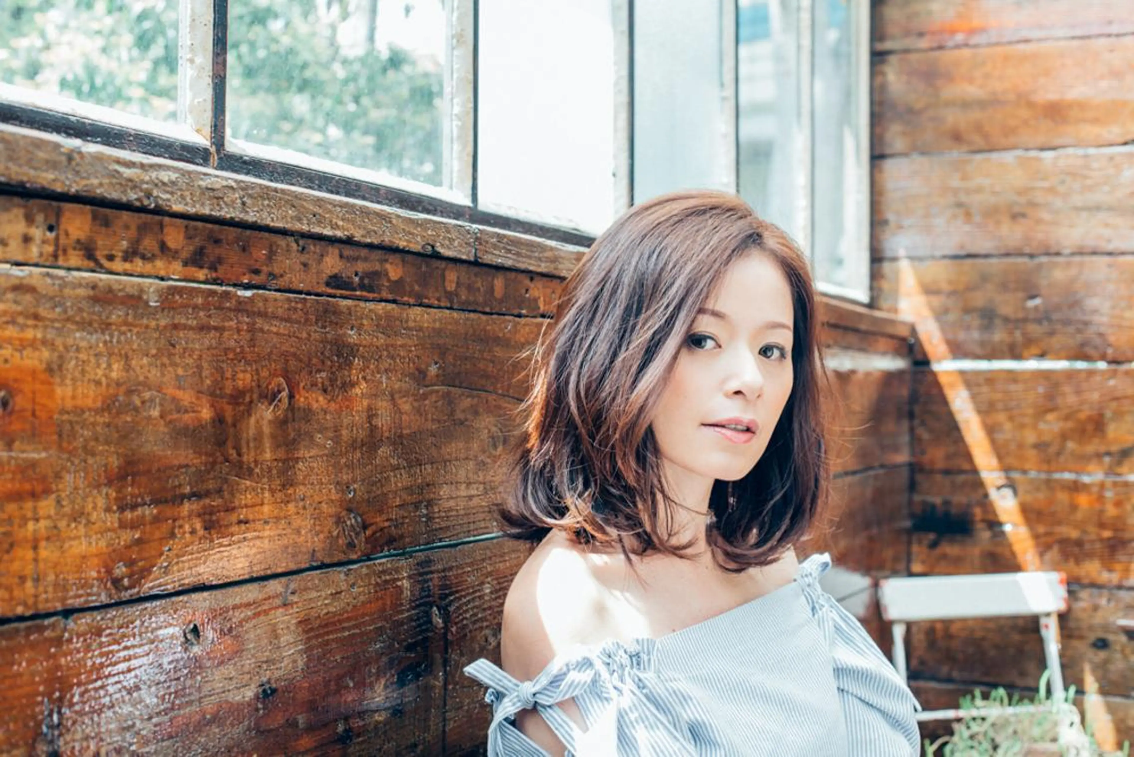 ミディアム 【デザイナー】田中 美生のヘアスタイル