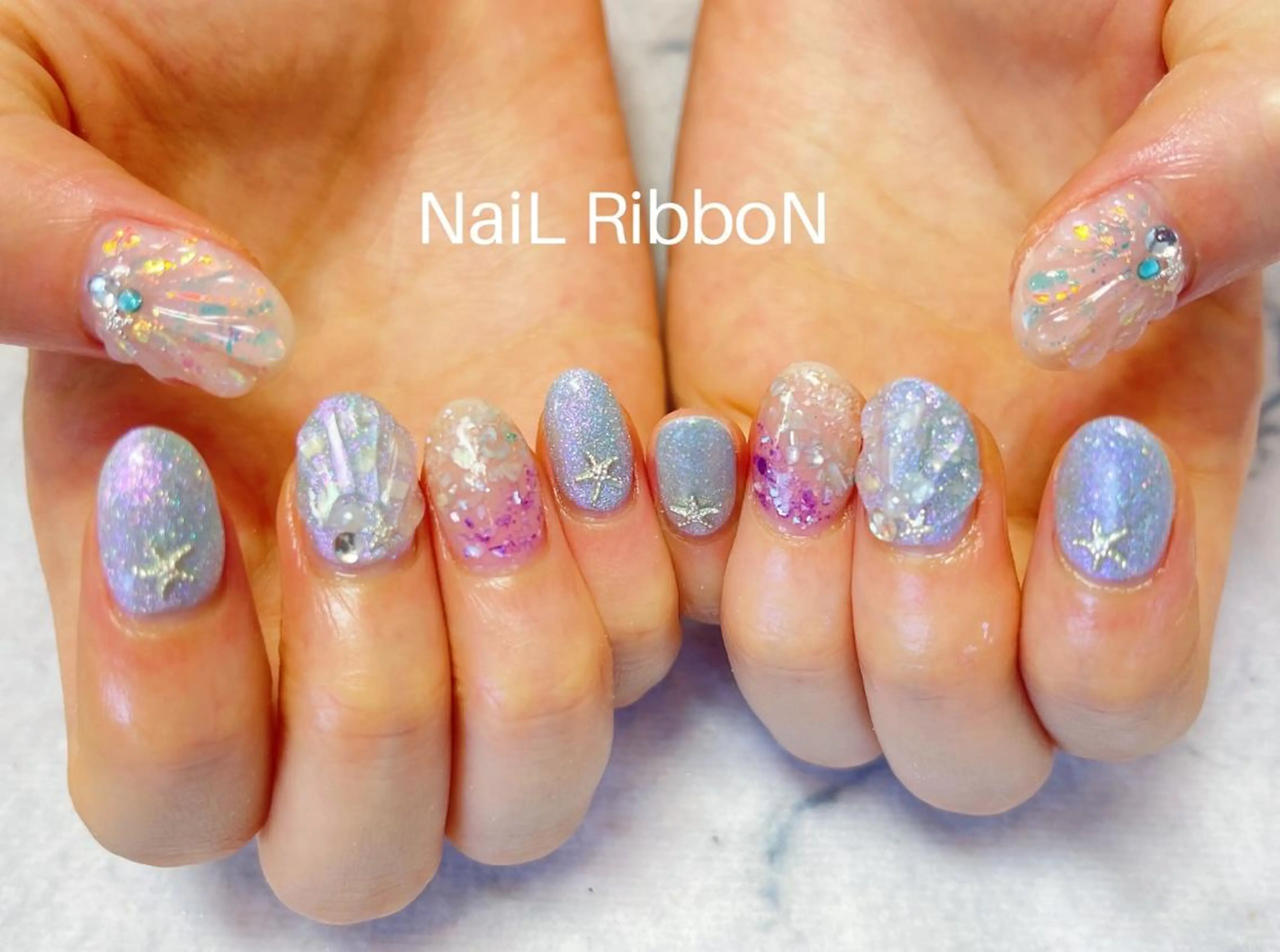 ネイル ネイルリボン 受付スタッフのネイルデザイン