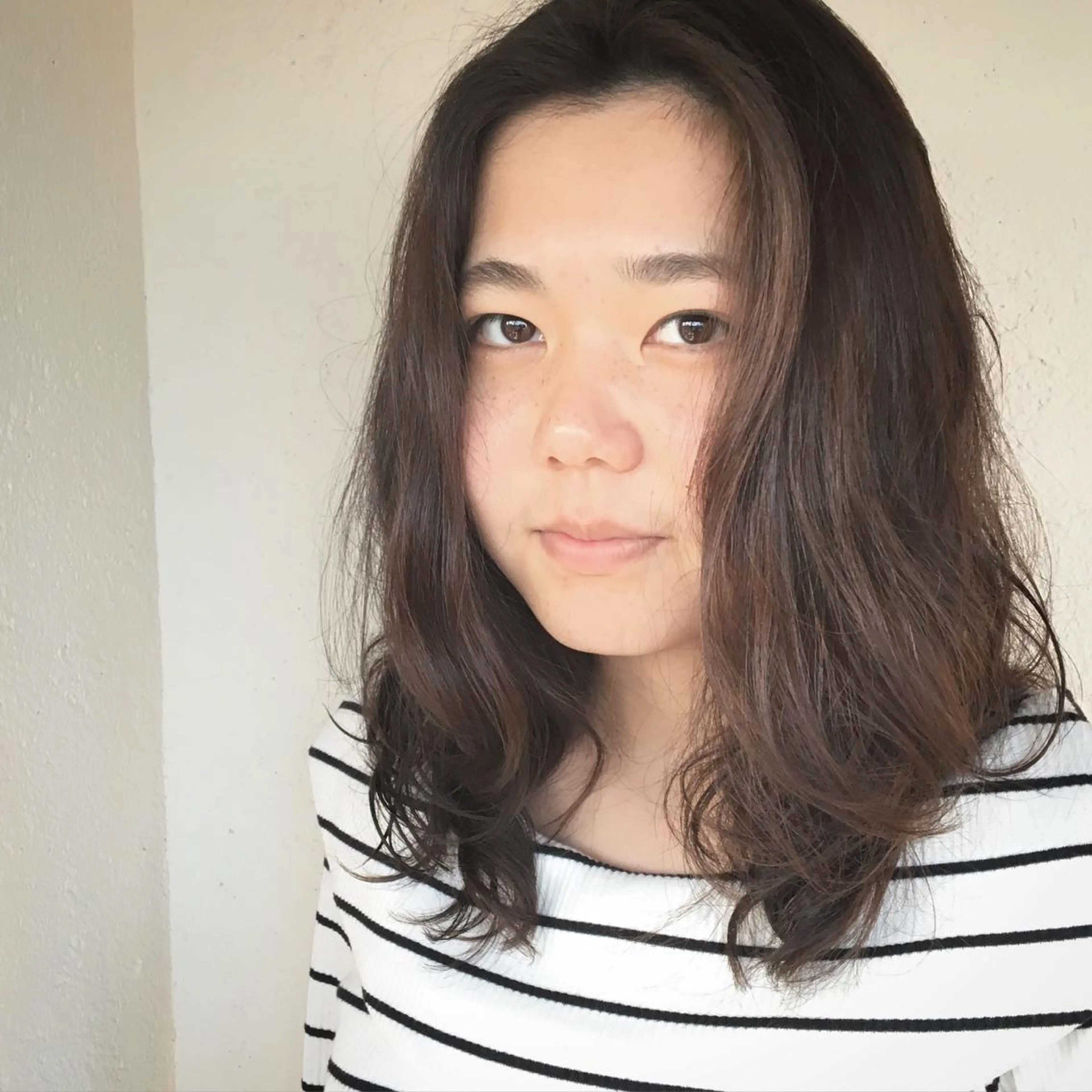 セミロング パーマ 永見 敏英のヘアスタイル