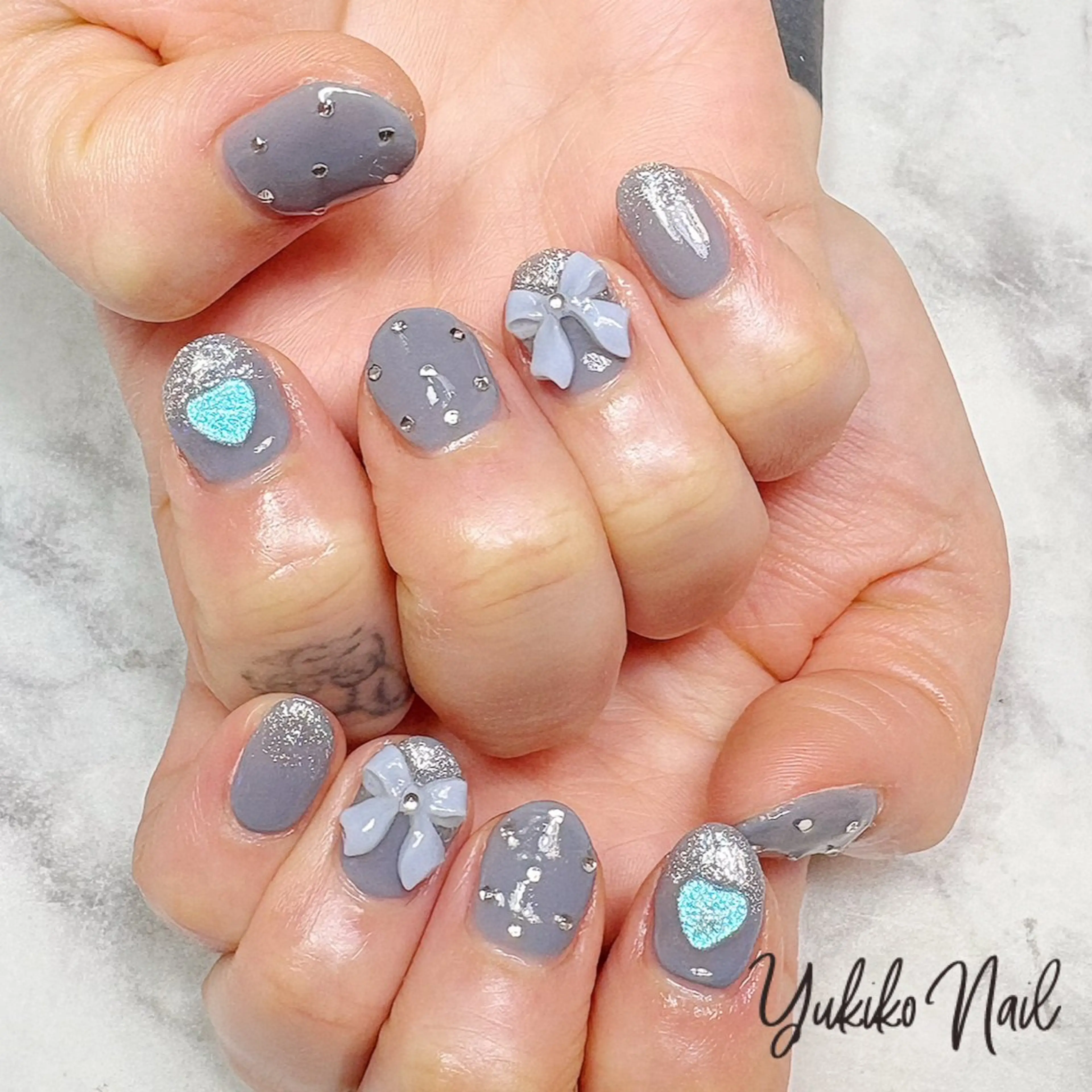 ネイル ブルー ガーリー ハート リボン ワンホンネイル ハンドネイル ユキコ ネイルのネイルデザイン