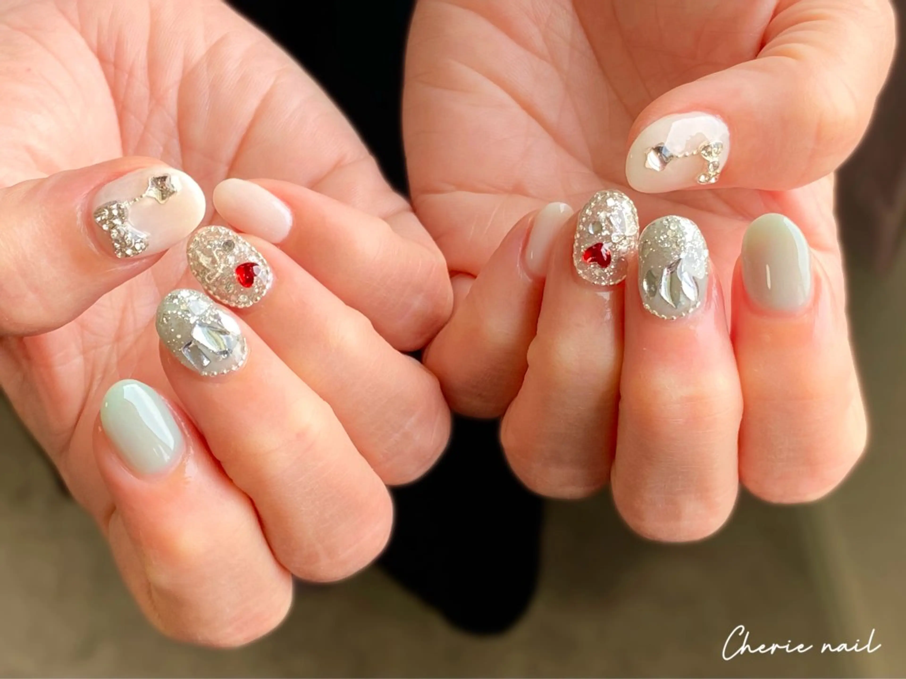 ネイル ジェルネイル キラキラネイル リボン 春ネイル ハンドネイル Cherienail yunaのネイルデザイン