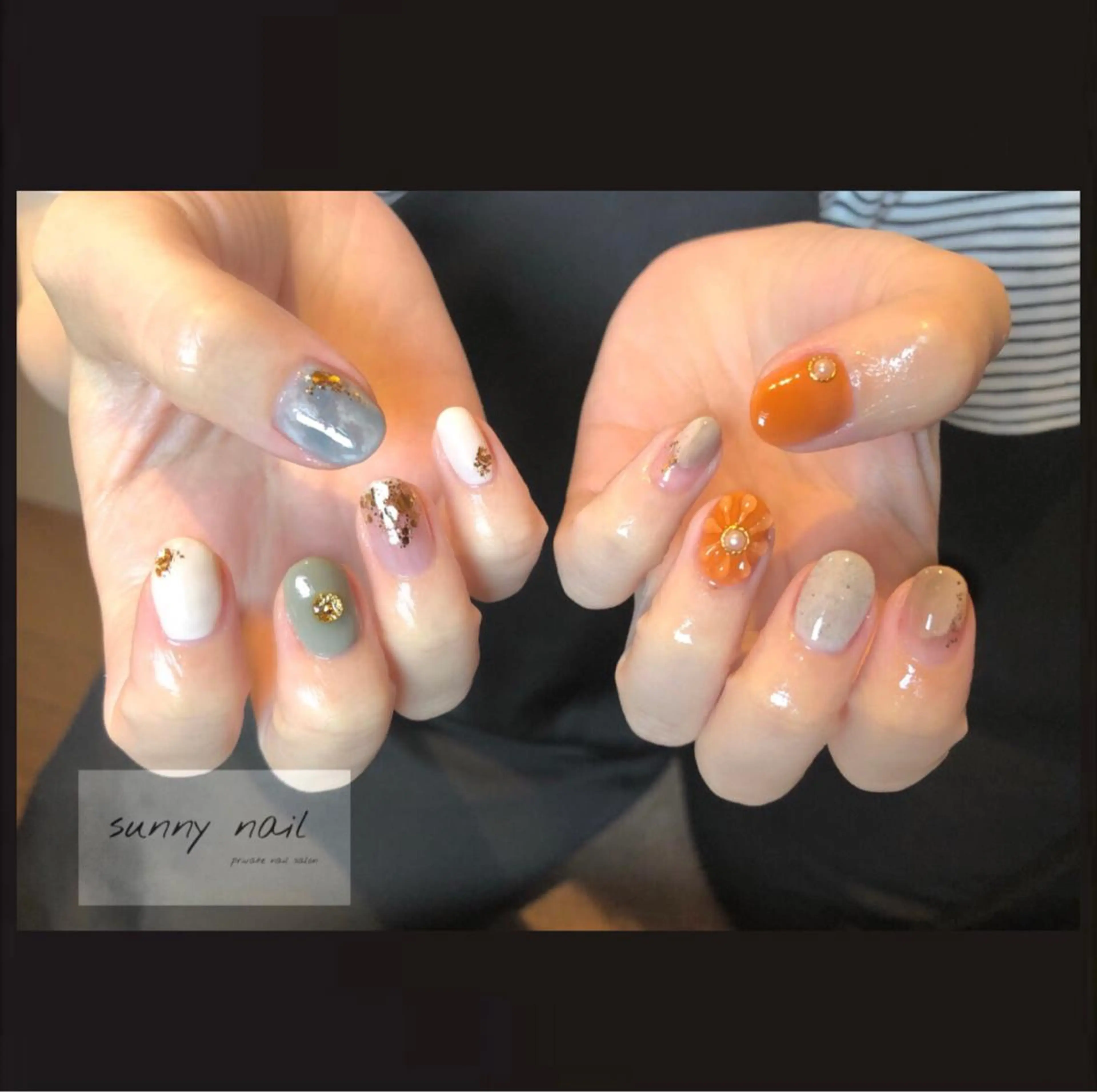ネイル フラワーネイル ジェルネイル 大理石ネイル(マーブル) ニュアンスネイル オレンジ sunny nailのネイルデザイン