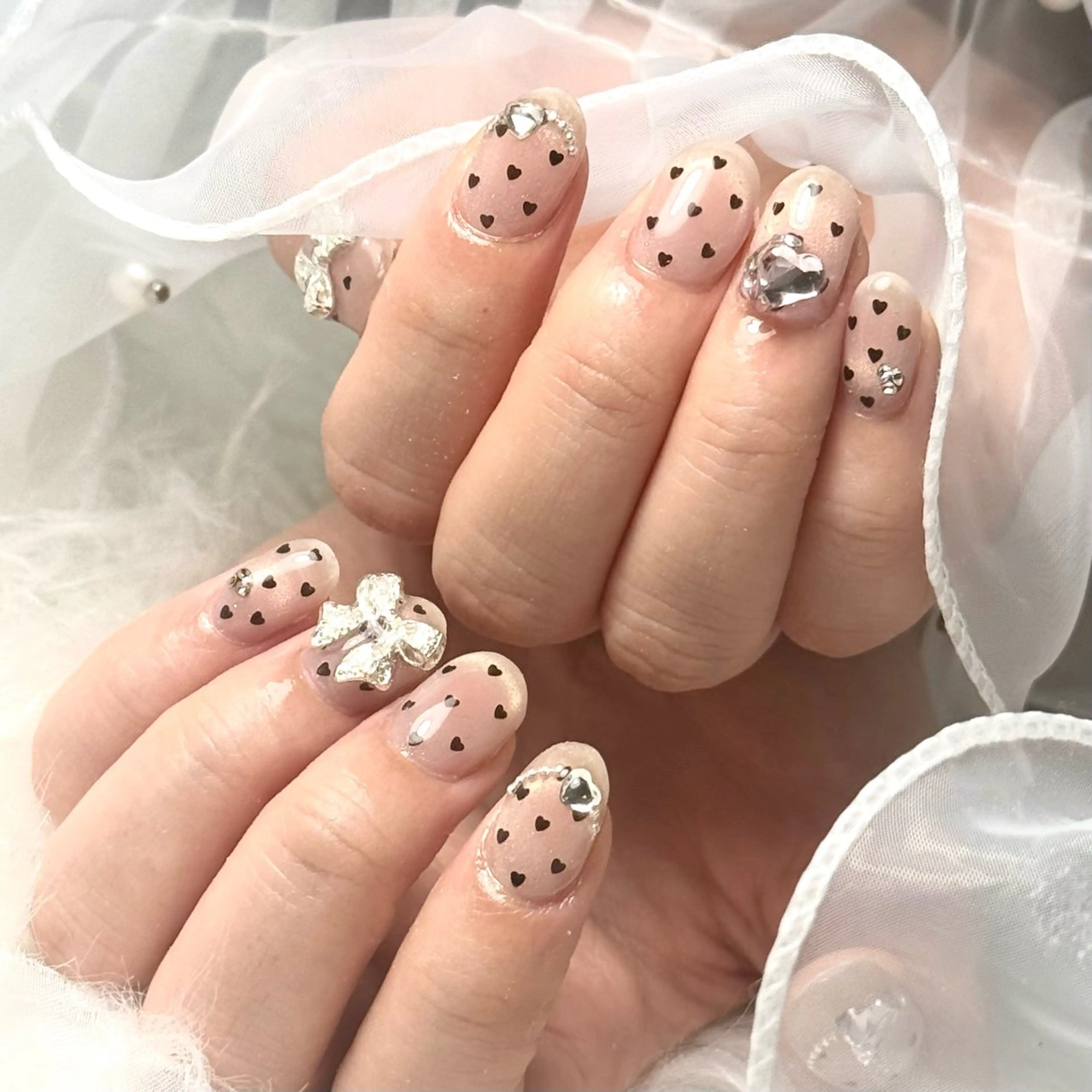 ネイル ハンドネイル ルシイ🎀新宿長さ 出しパーツ専門店のネイルデザイン