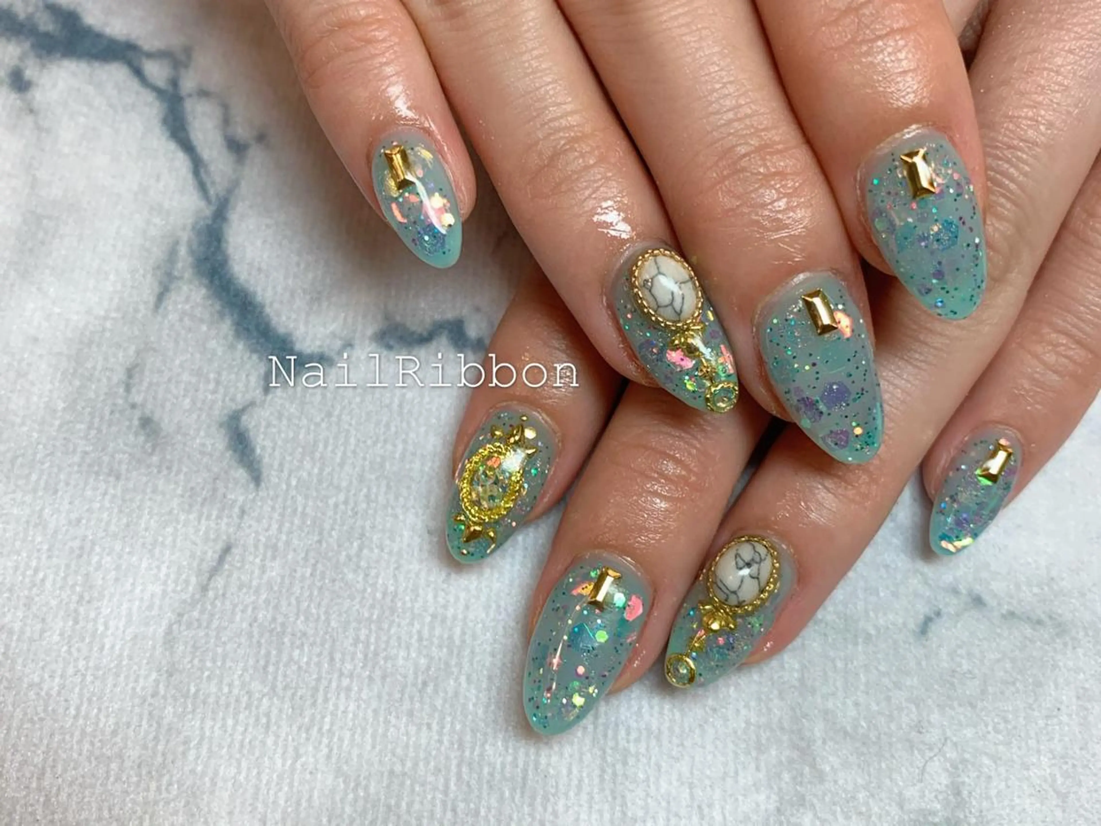 ネイル ネイルリボン 受付スタッフのネイルデザイン