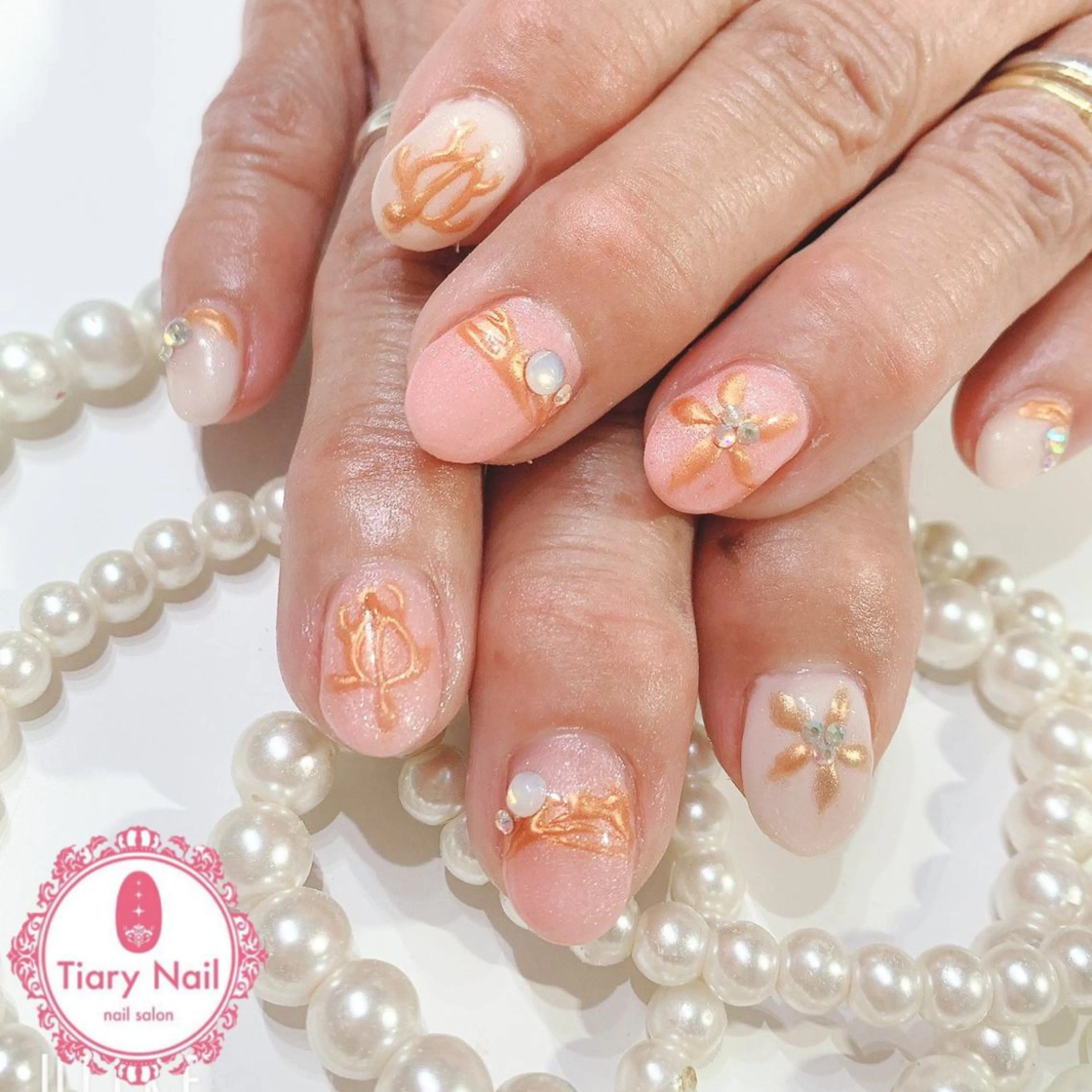 ネイル 桜ネイル クリアネイル フットネイル ジェルネイル キラキラネイル ハンドネイル 💗🪽Tiary Nail🪽💗のネイルデザイン