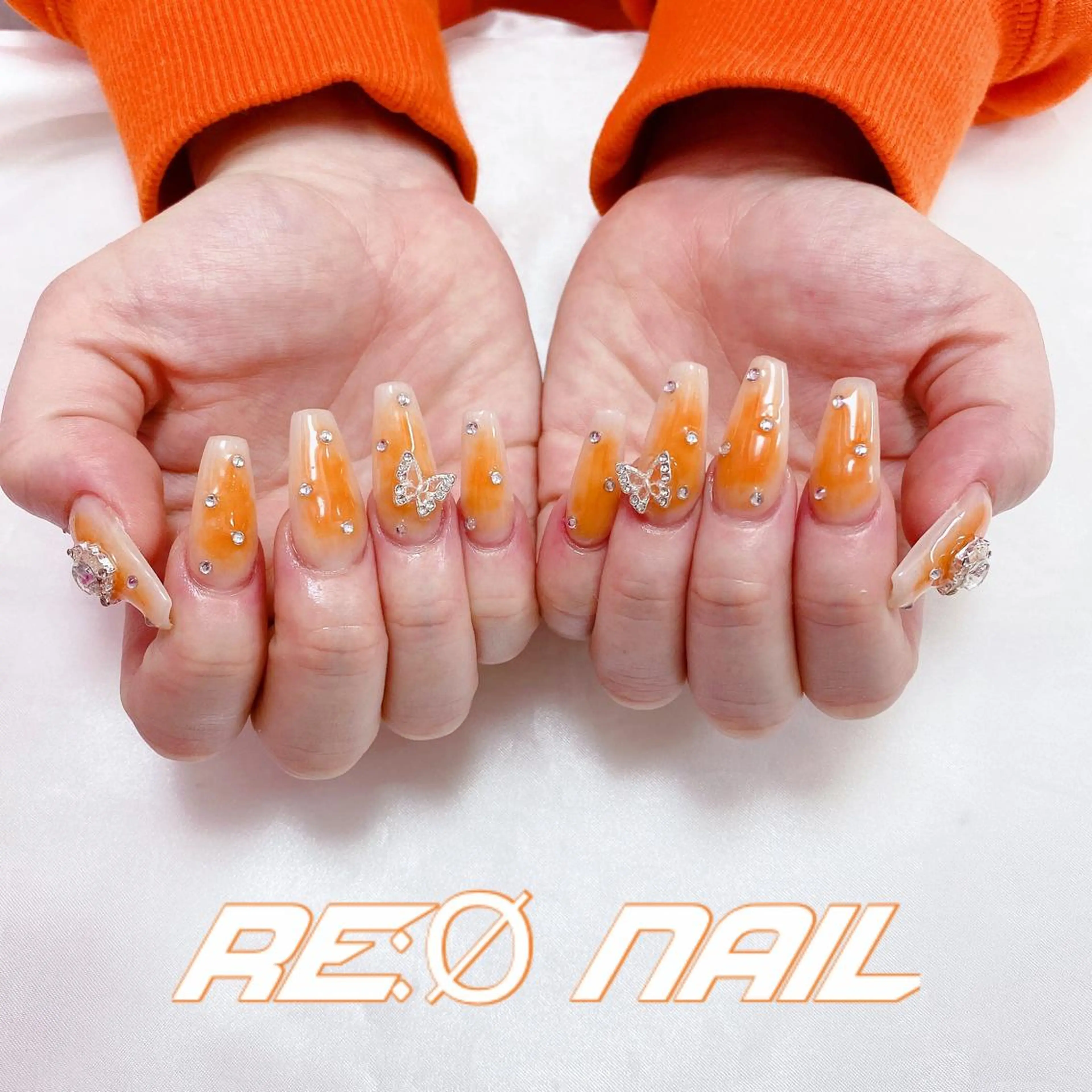ネイル チークネイル オレンジ ハンドネイル Re:Ø nail 🩵TSUJIのネイルデザイン