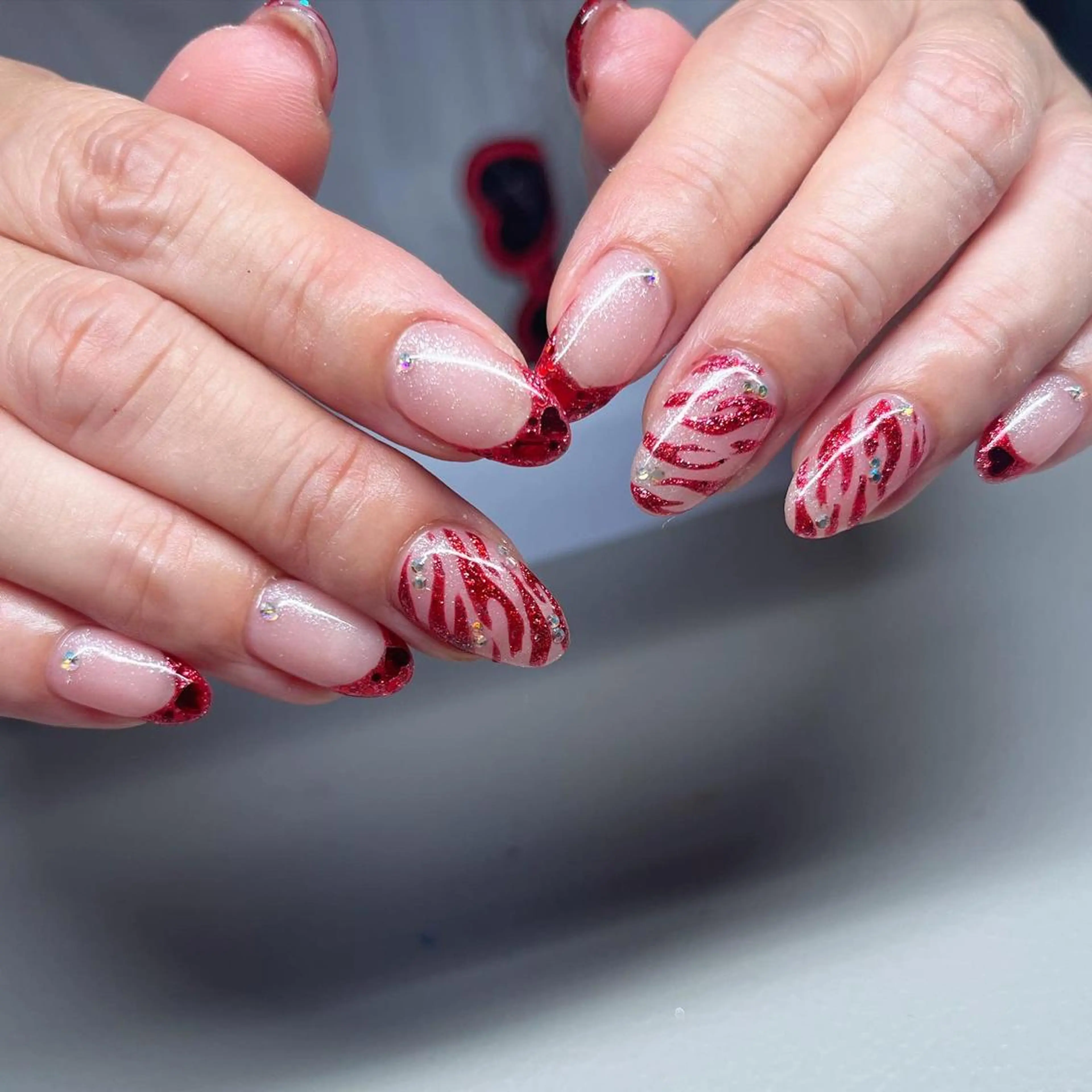 ネイル アニマル柄 赤色 587nail *のネイルデザイン