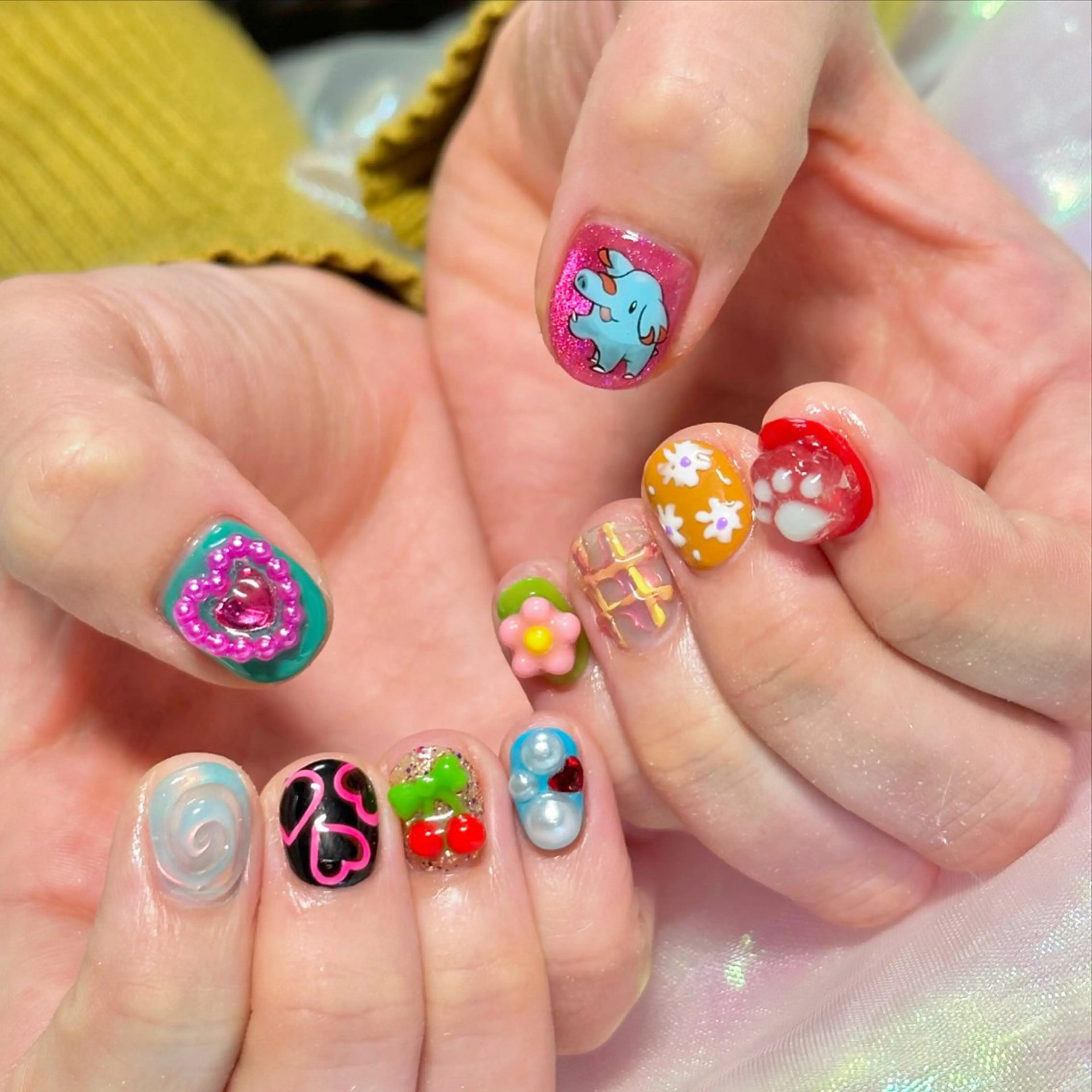 ネイル ハンドネイル OKIKA所属・【OKIKA】 らん🦖🌈🧡のマツエク・マツパデザイン