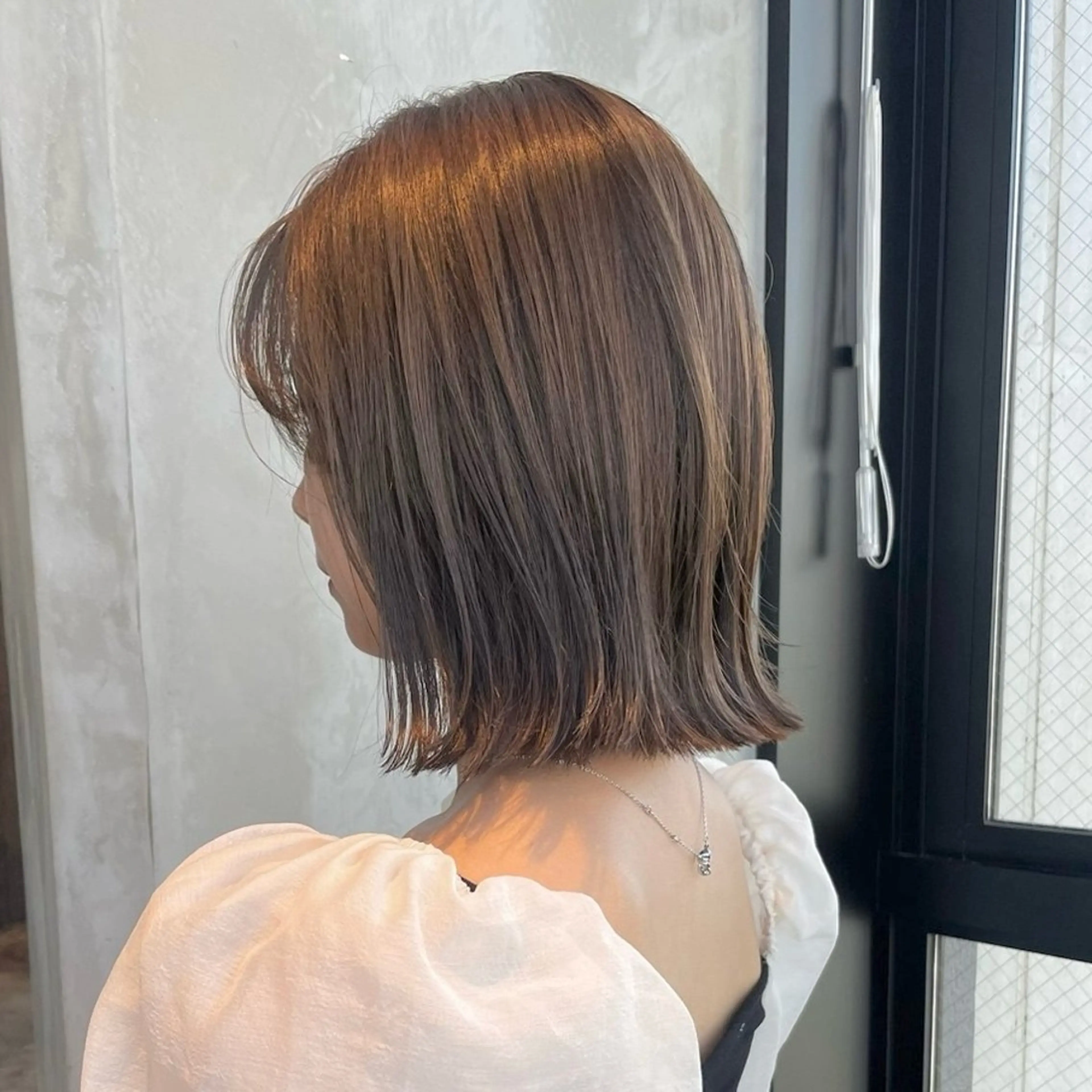 ショート カラー 切りっぱなしボブ オリーブカラー ボブ 髪質改善 外ハネヘア カット ヘアカラー トリートメント 渋谷／タッセルボブ ／顔周り/加邊凌也のヘアスタイル