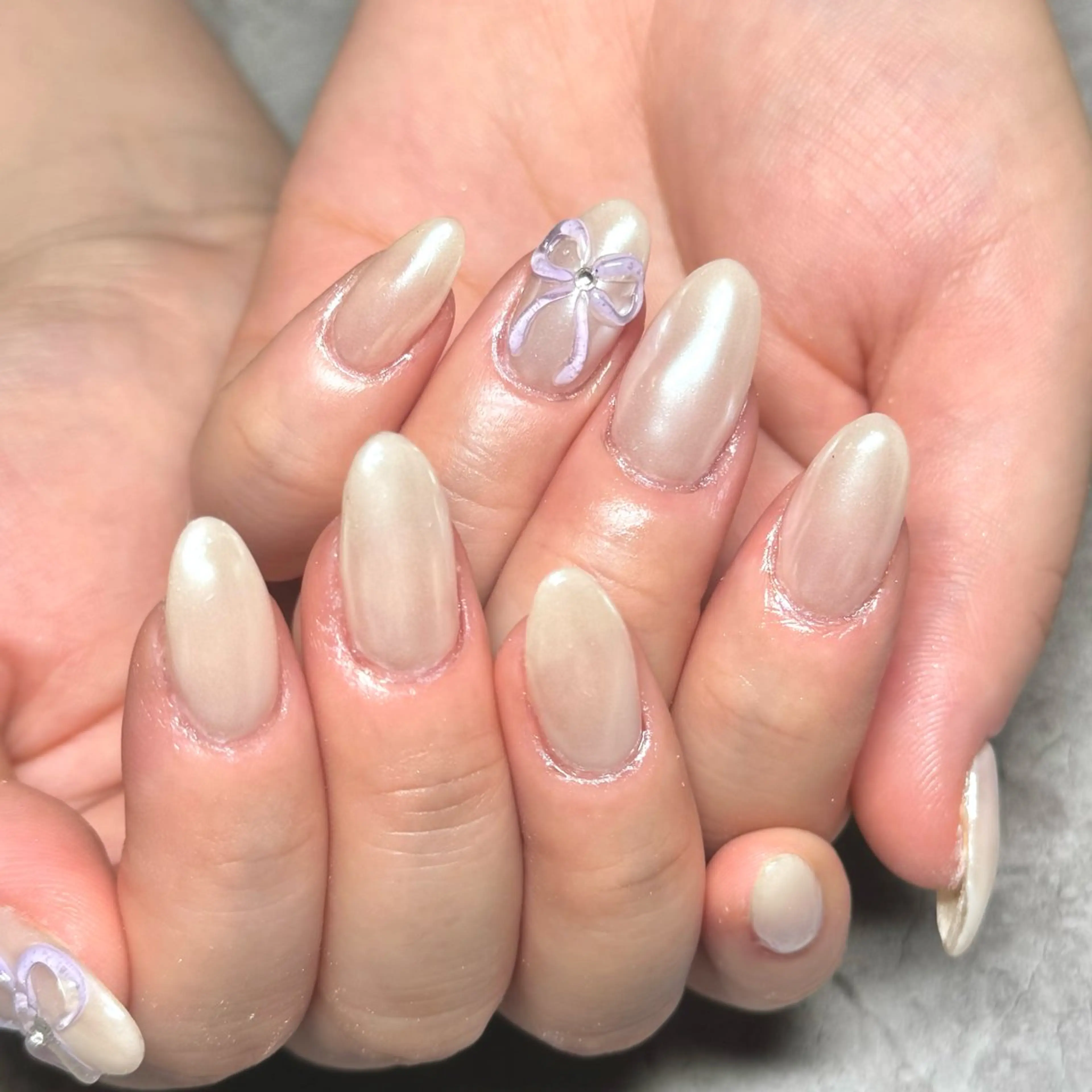 ネイル アートネイル オーロラネイル キラキラネイル ぷっくりネイル リボン ハンドネイル Nail Salon Lillion【リリオン】所属・lillion karenのネイルデザイン