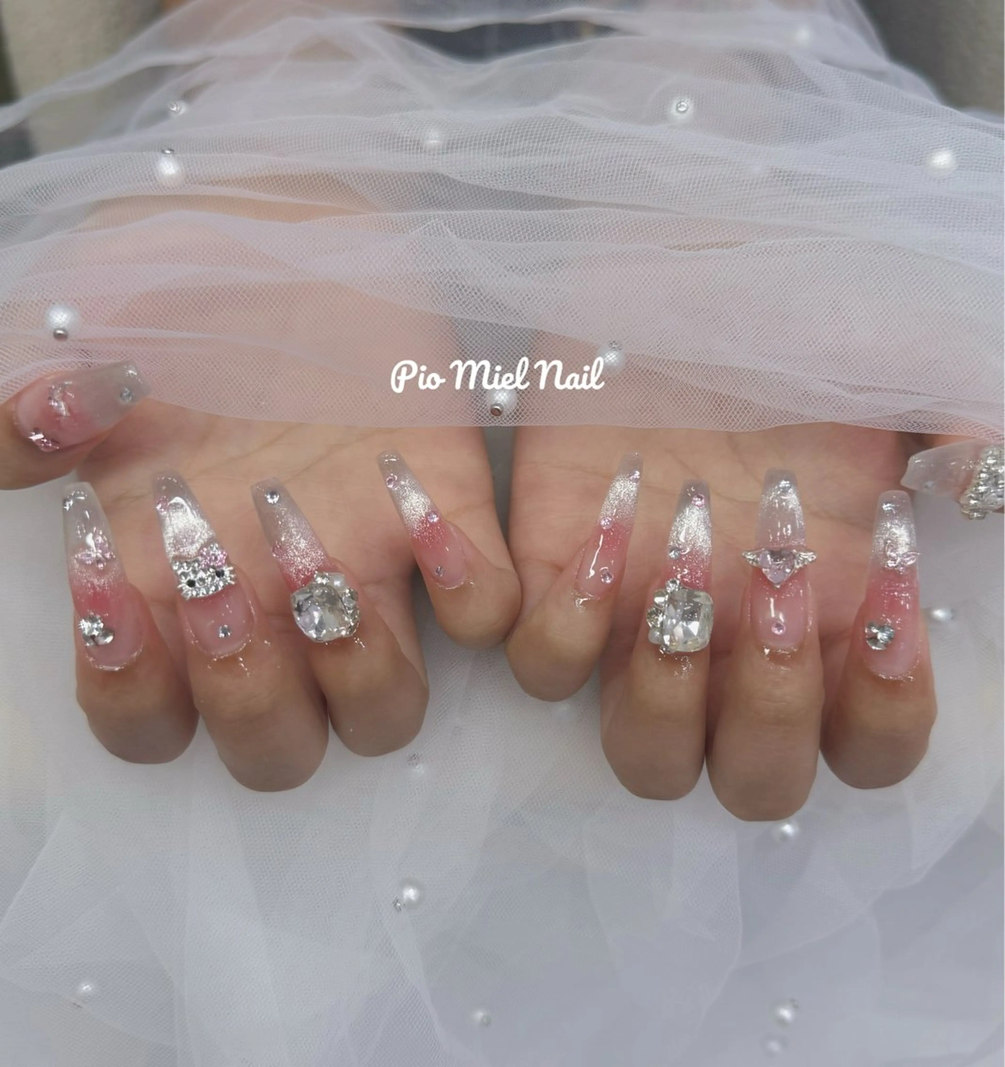 セミロング ハンドネイル Pio Mielのネイルデザイン