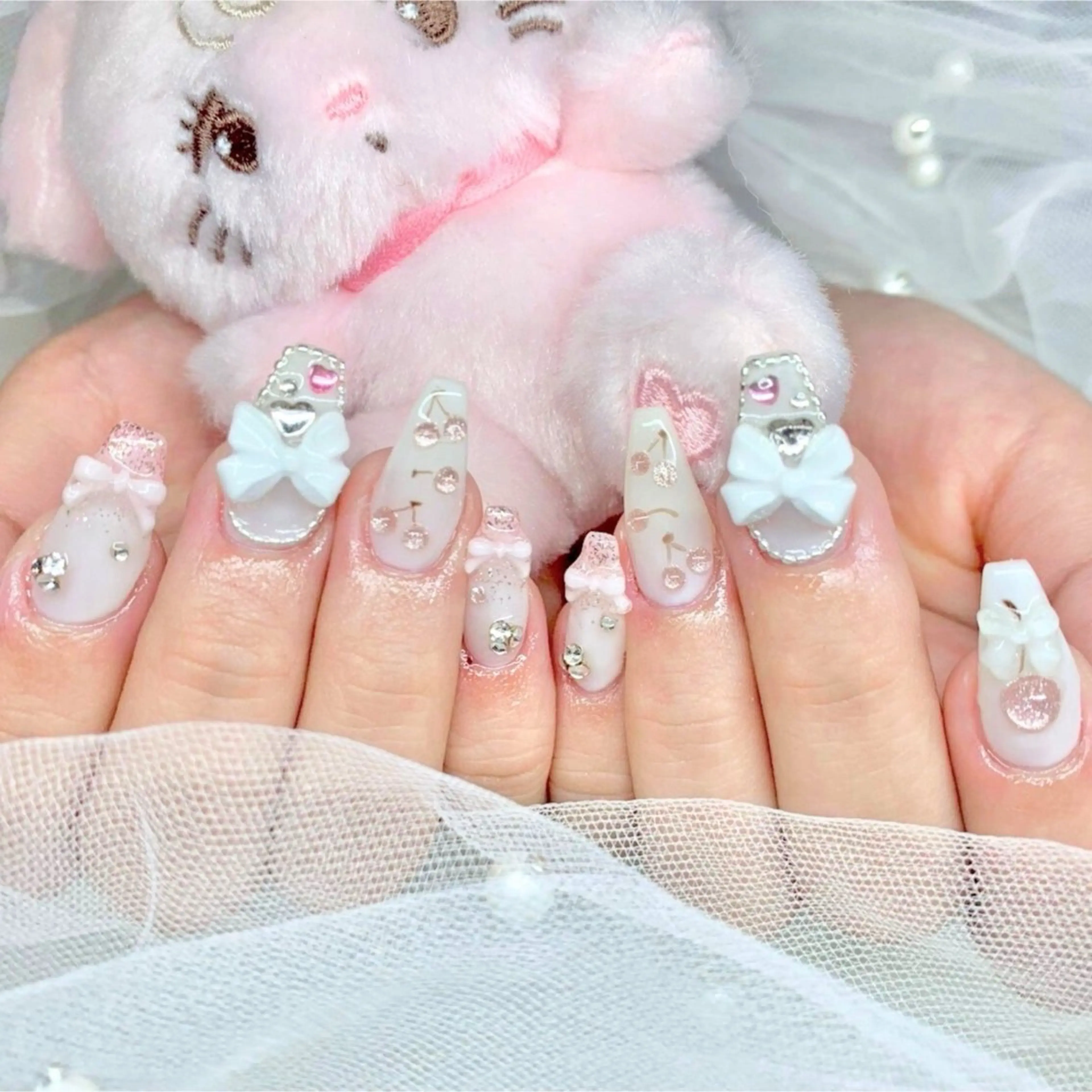 ネイル ハンドネイル フットネイル TiTi Pomme Rinoのネイルデザイン