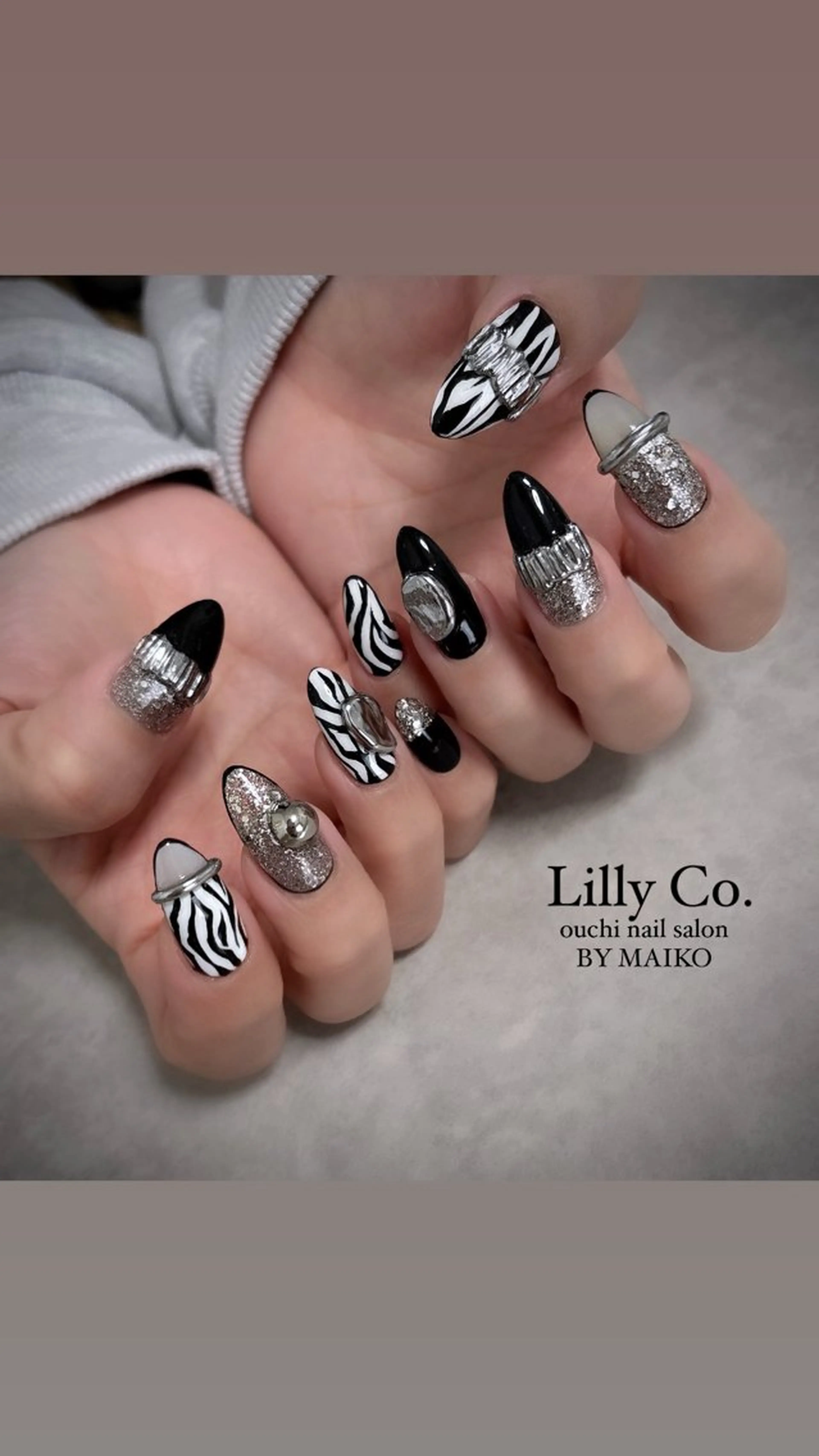 ネイル アニマル柄 シルバー ハンドネイル ハンドケア Lilly Co.のネイルデザイン