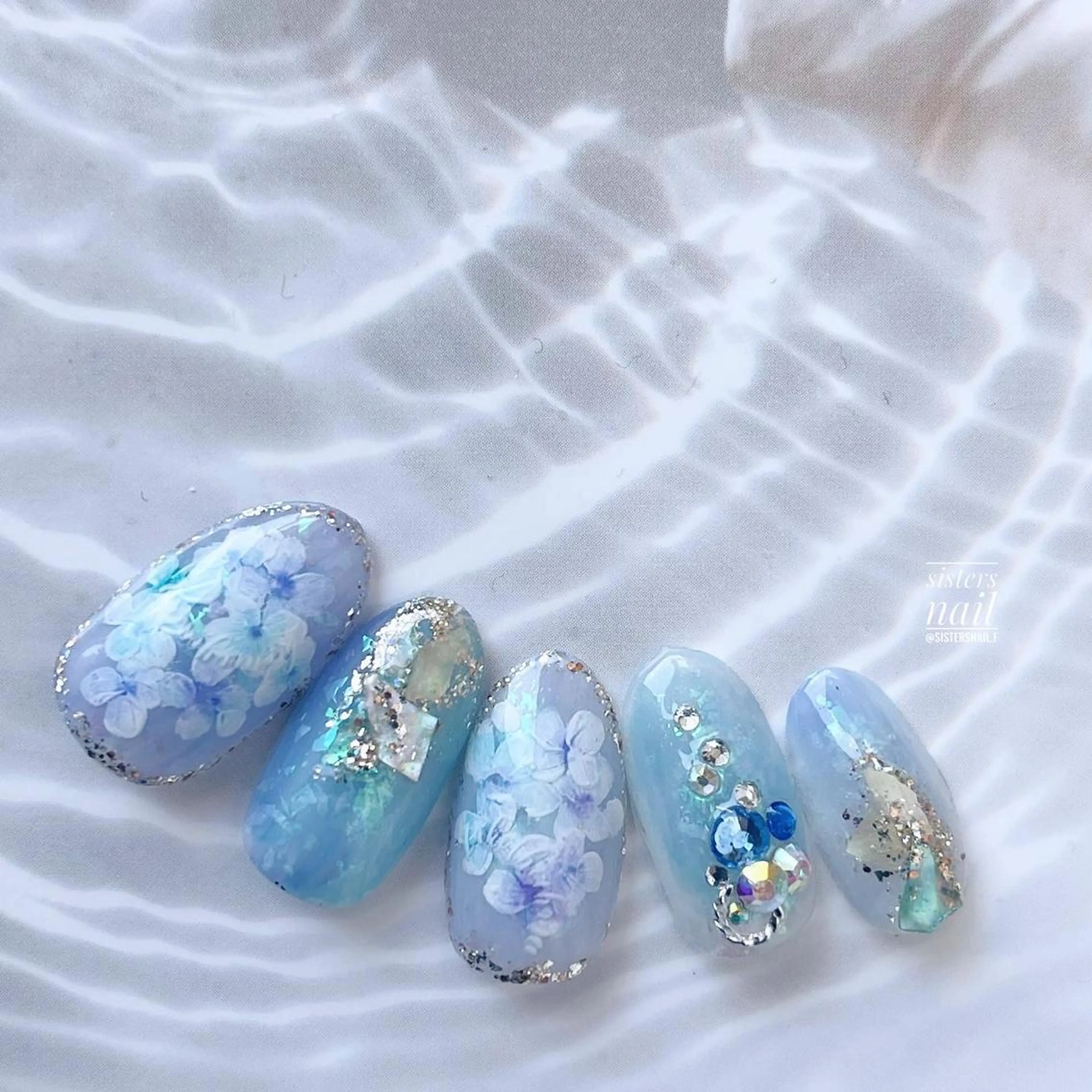 ネイル アートネイル ブルー キラキラネイル 夏ネイル sisters nail.fのネイルデザイン