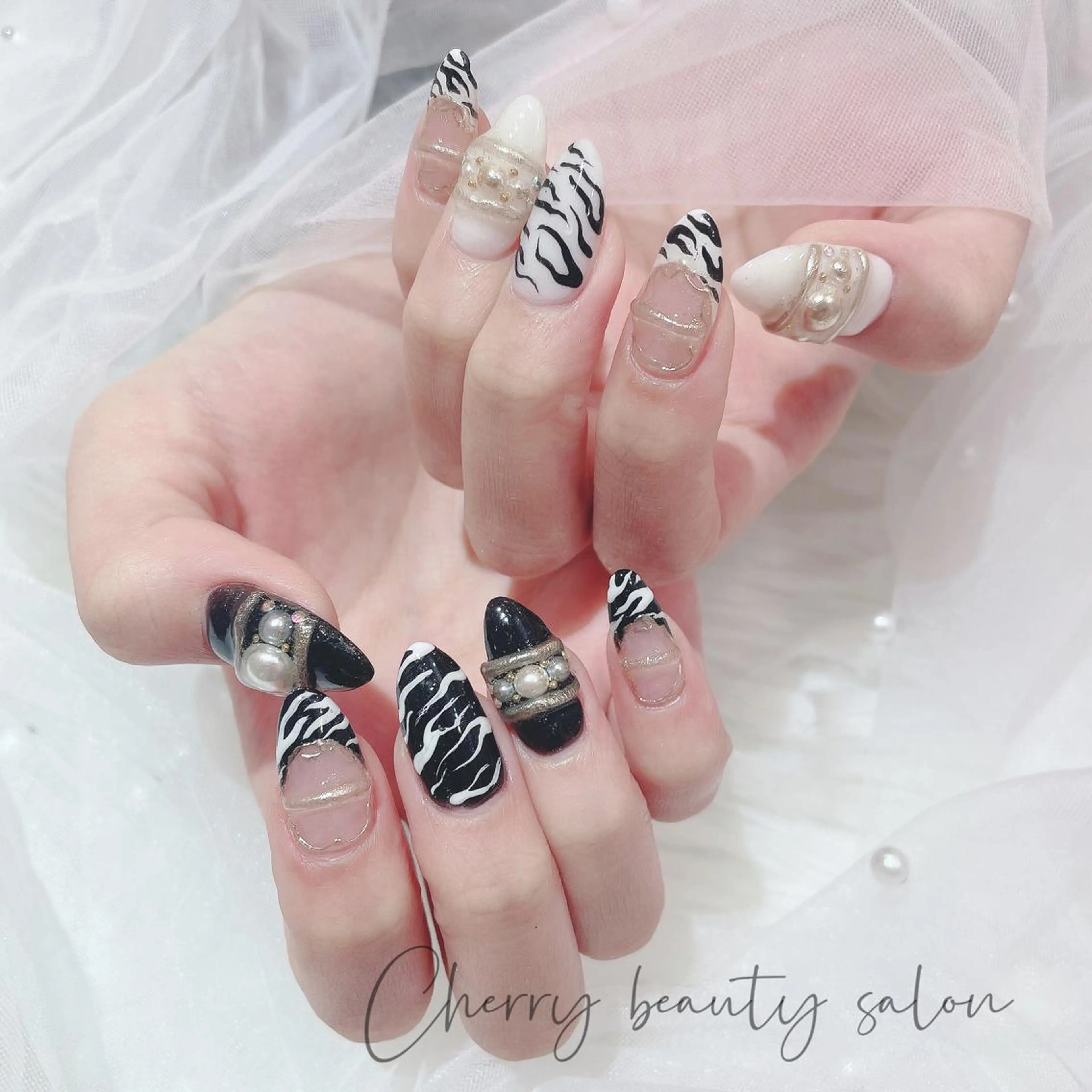 ネイル SAKURA 🍒のネイルデザイン