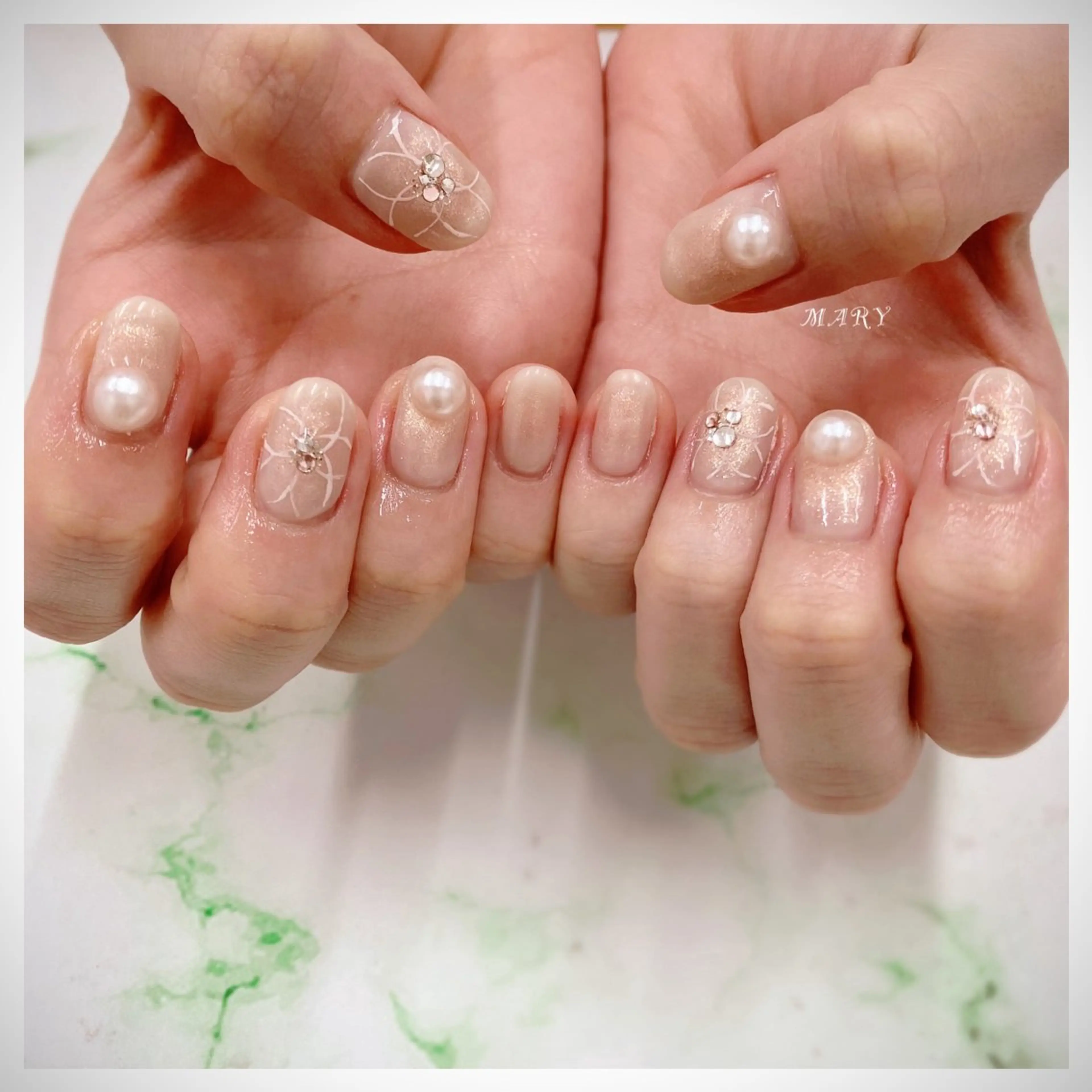 ネイル チークネイル フラワーネイル ニュアンスネイル ピンク 春ネイル ハンドネイル Mary nail所属・Mary nail .narumiのネイルデザイン
