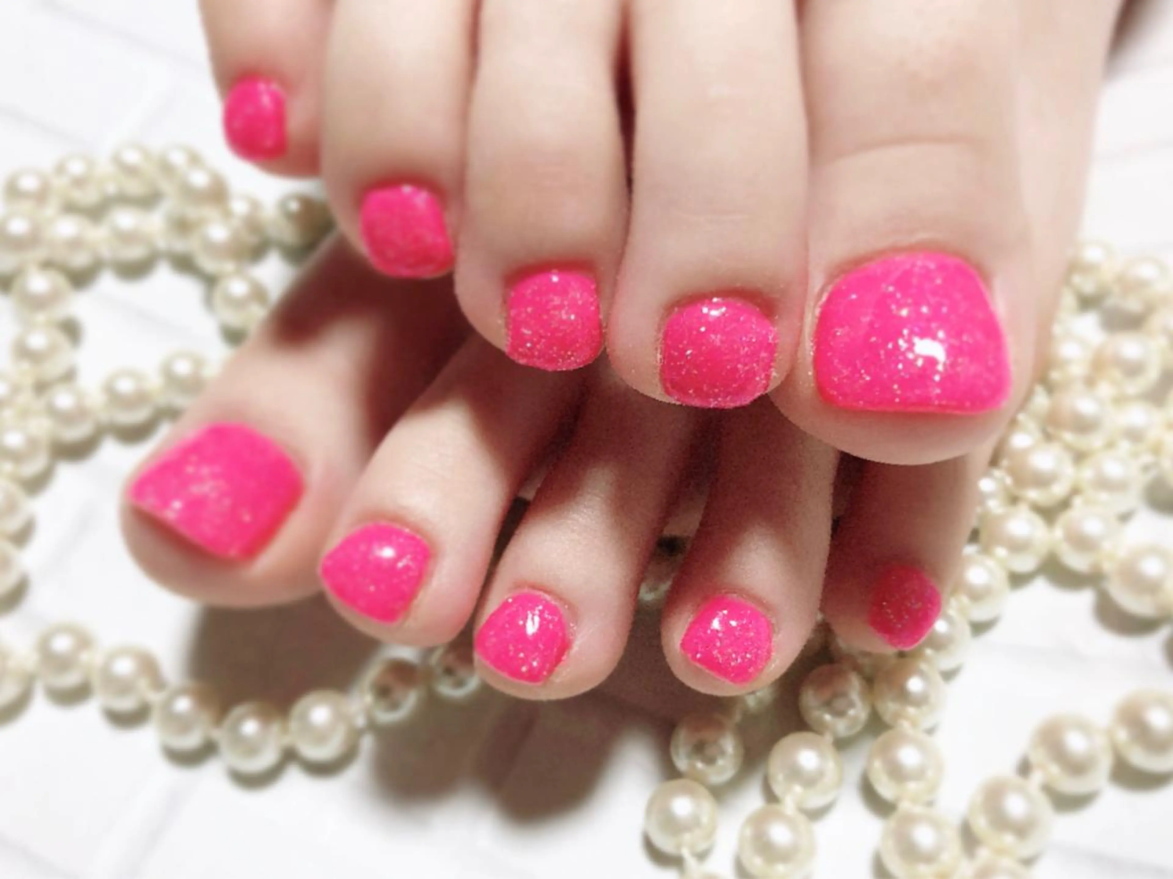 ネイル ラメ(グリッター) ピンク フットネイル ネイルサロン HARRYS所属・ネイル･脱毛サロン HARRYSのエステ・リラクイメージ