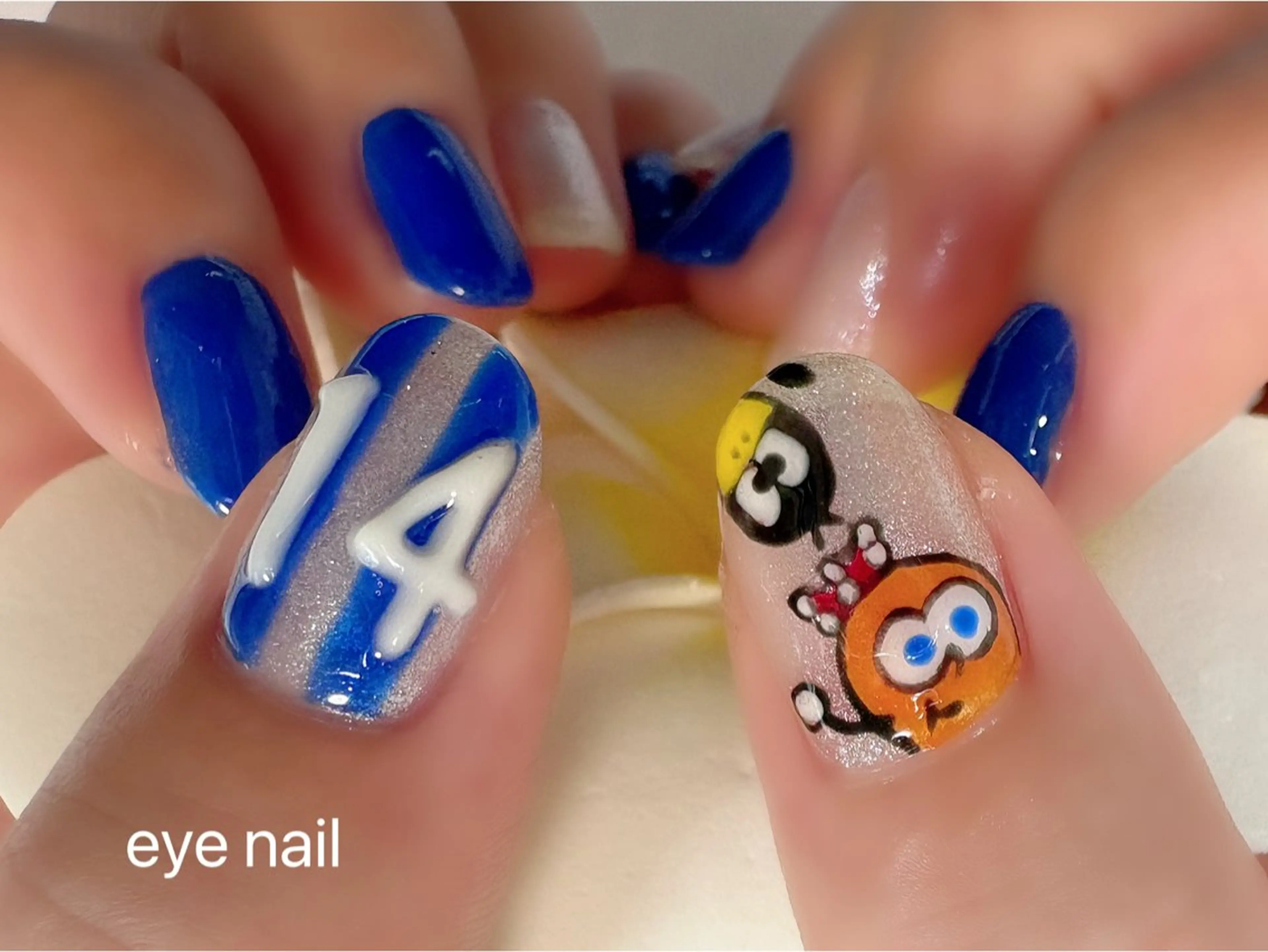 ネイル アートネイル ブルー ジェルネイル ラメ(グリッター) ハンドネイル Eye nailのネイルデザイン