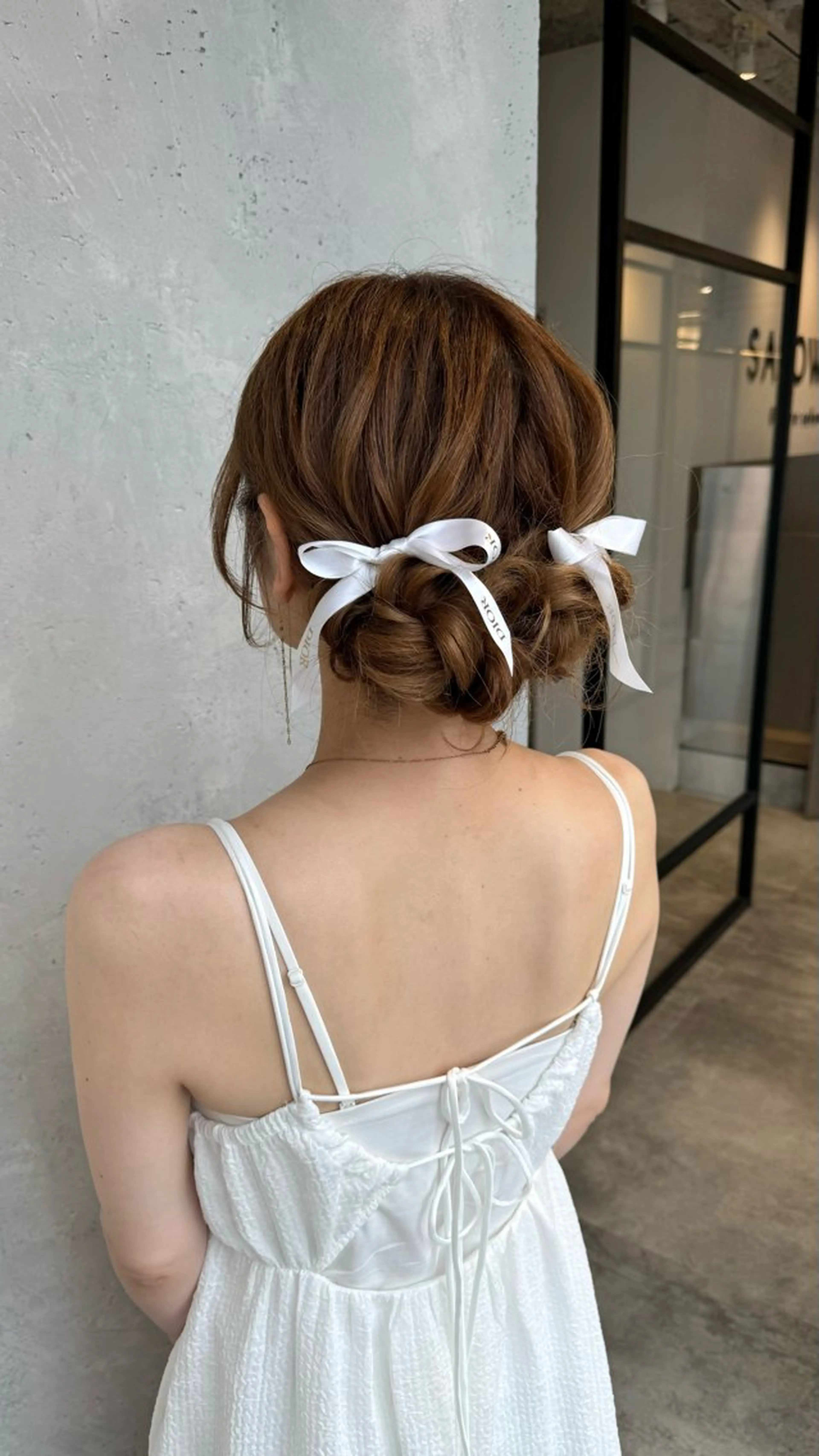 ヘアアレンジ お団子ヘア ヘアセット レイヤーカット✂︎池 袋個室サロンkumaのヘアスタイル