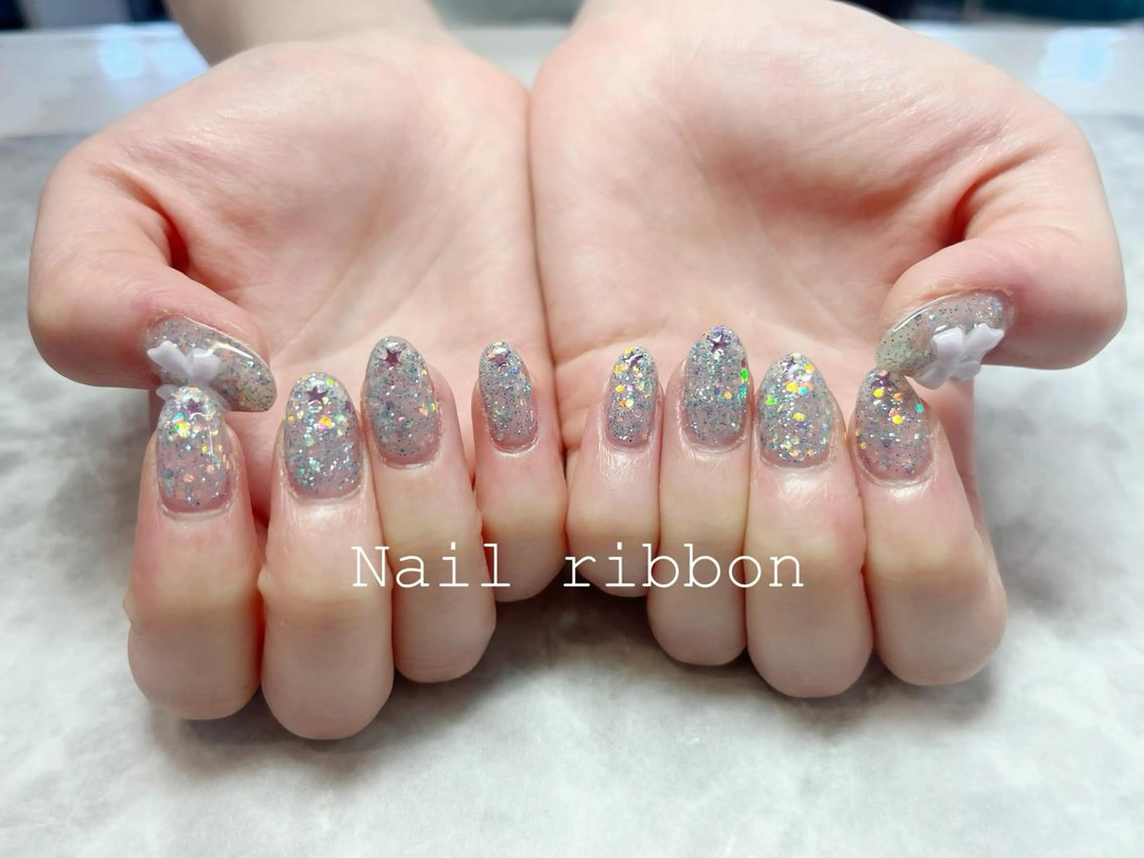 ネイル ネイルリボン 受付スタッフのネイルデザイン