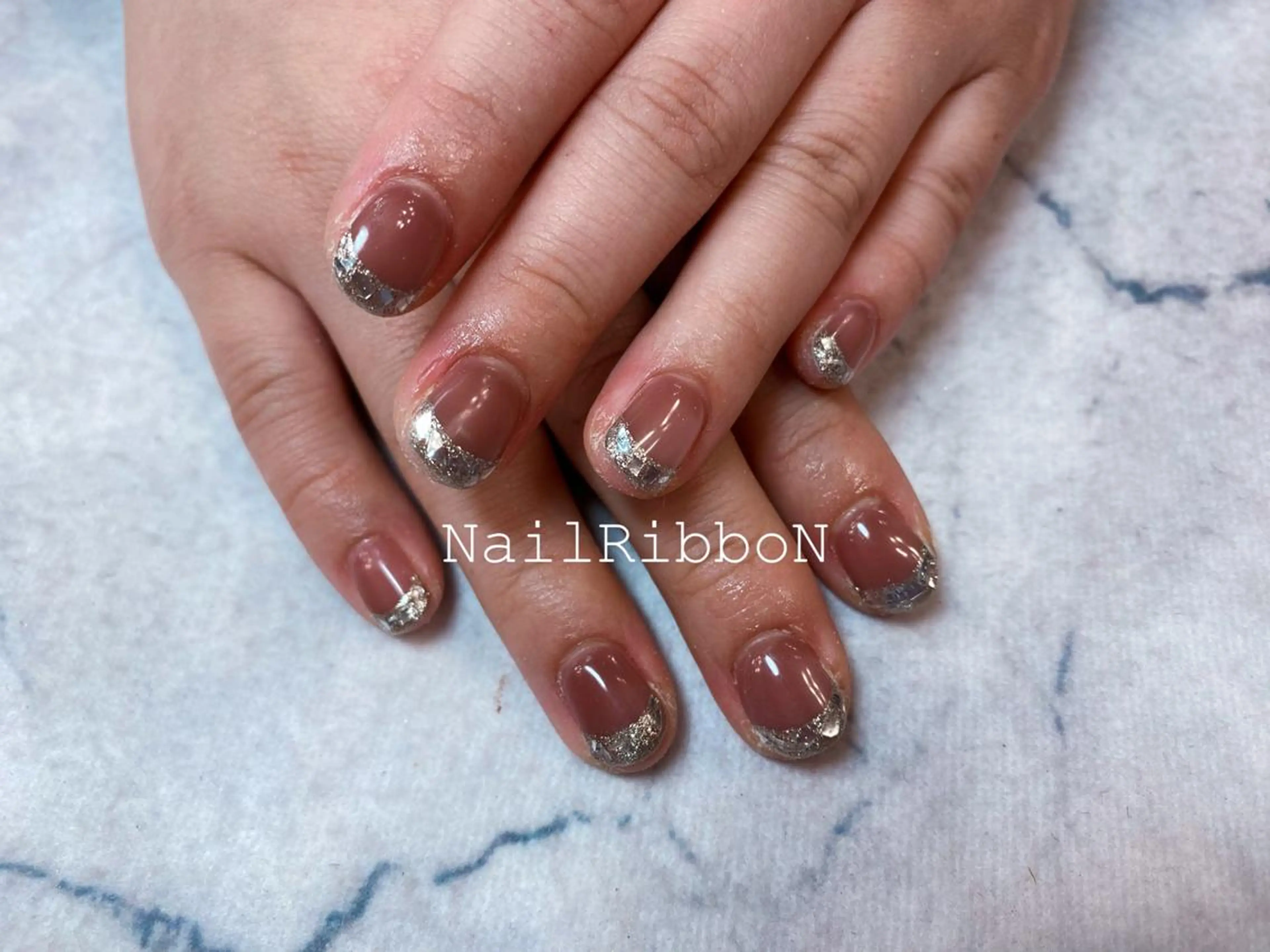 ネイル ネイルリボン 受付スタッフのネイルデザイン