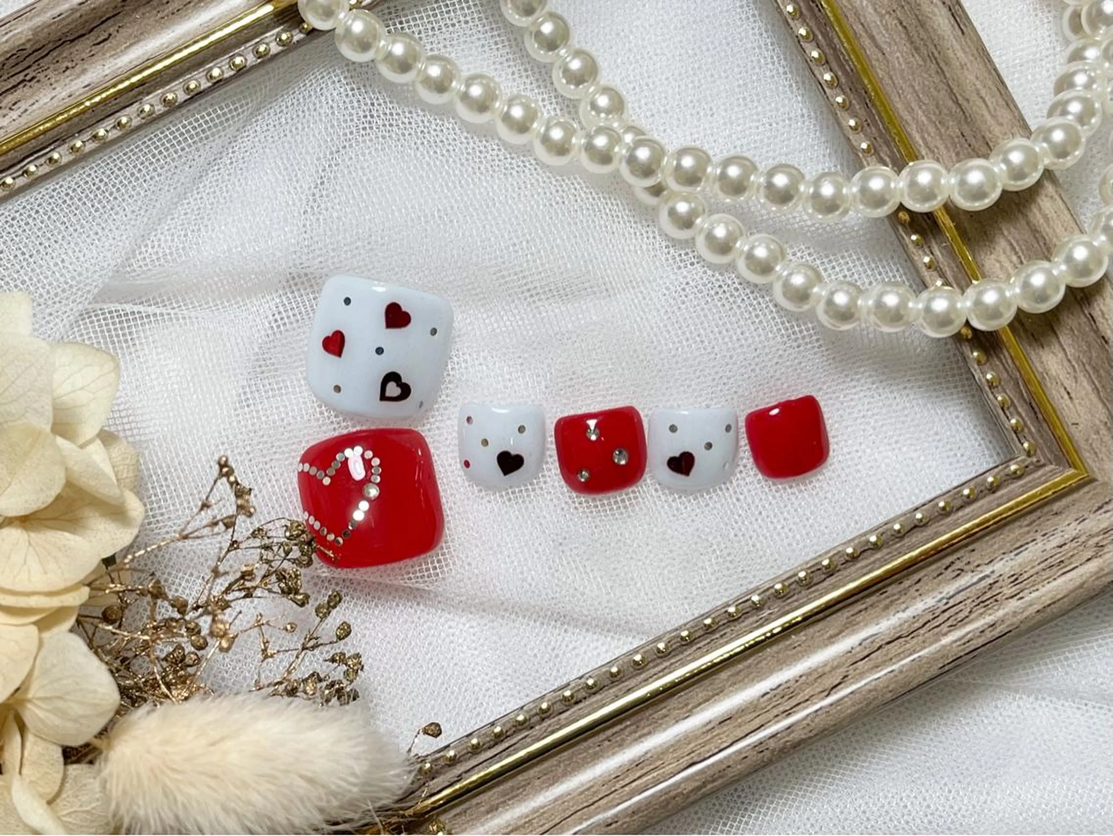 ネイル ネイルPetit Ribbonのネイルデザイン